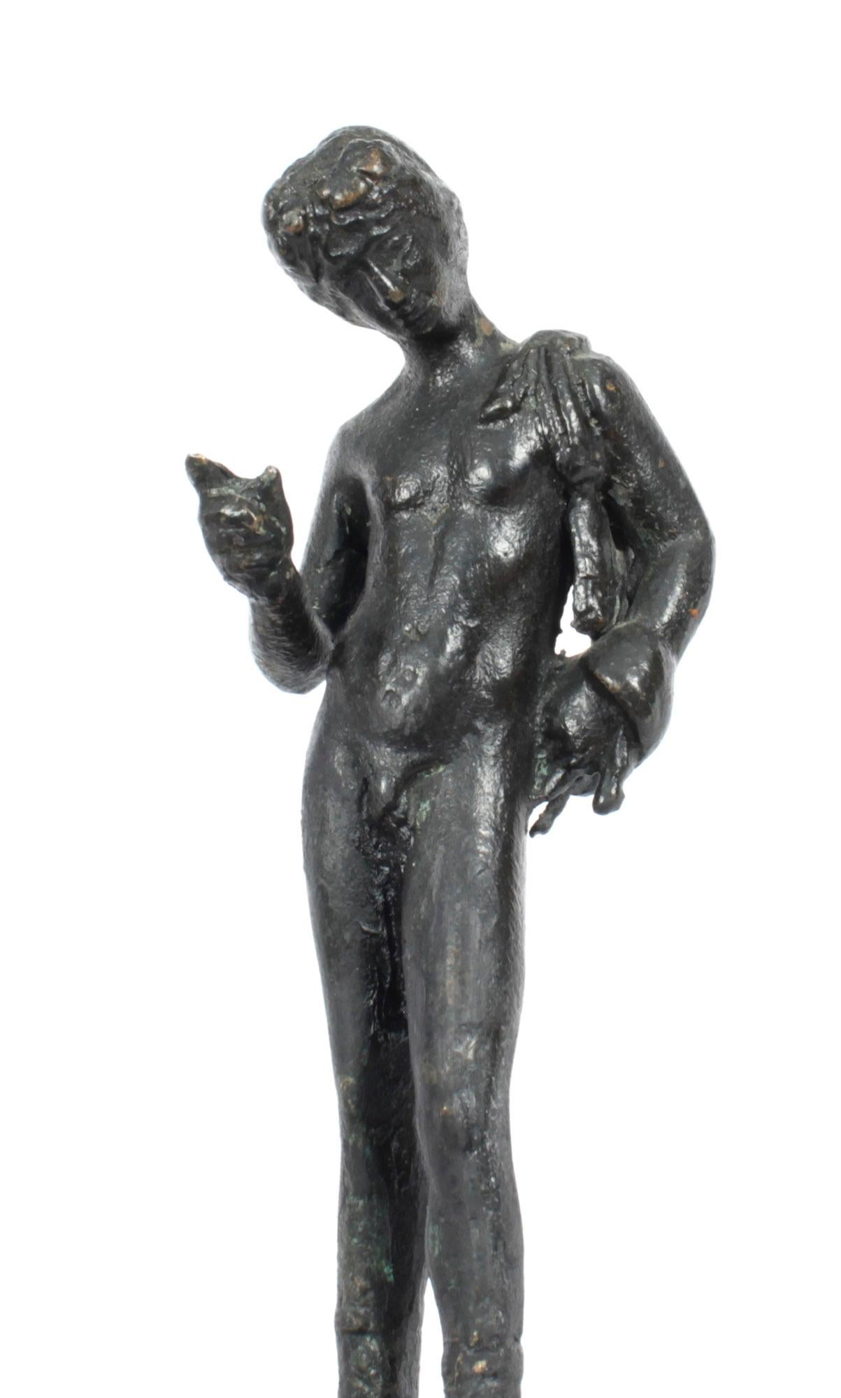 This is a superb antique novelty Grand Tour patinated bronze figure of Narcissus, dating from the late 19th Century.

Narcissus was a hunter in Greek mythology and he was distinguished for his beauty.
 
This patinated bronze classical figure is