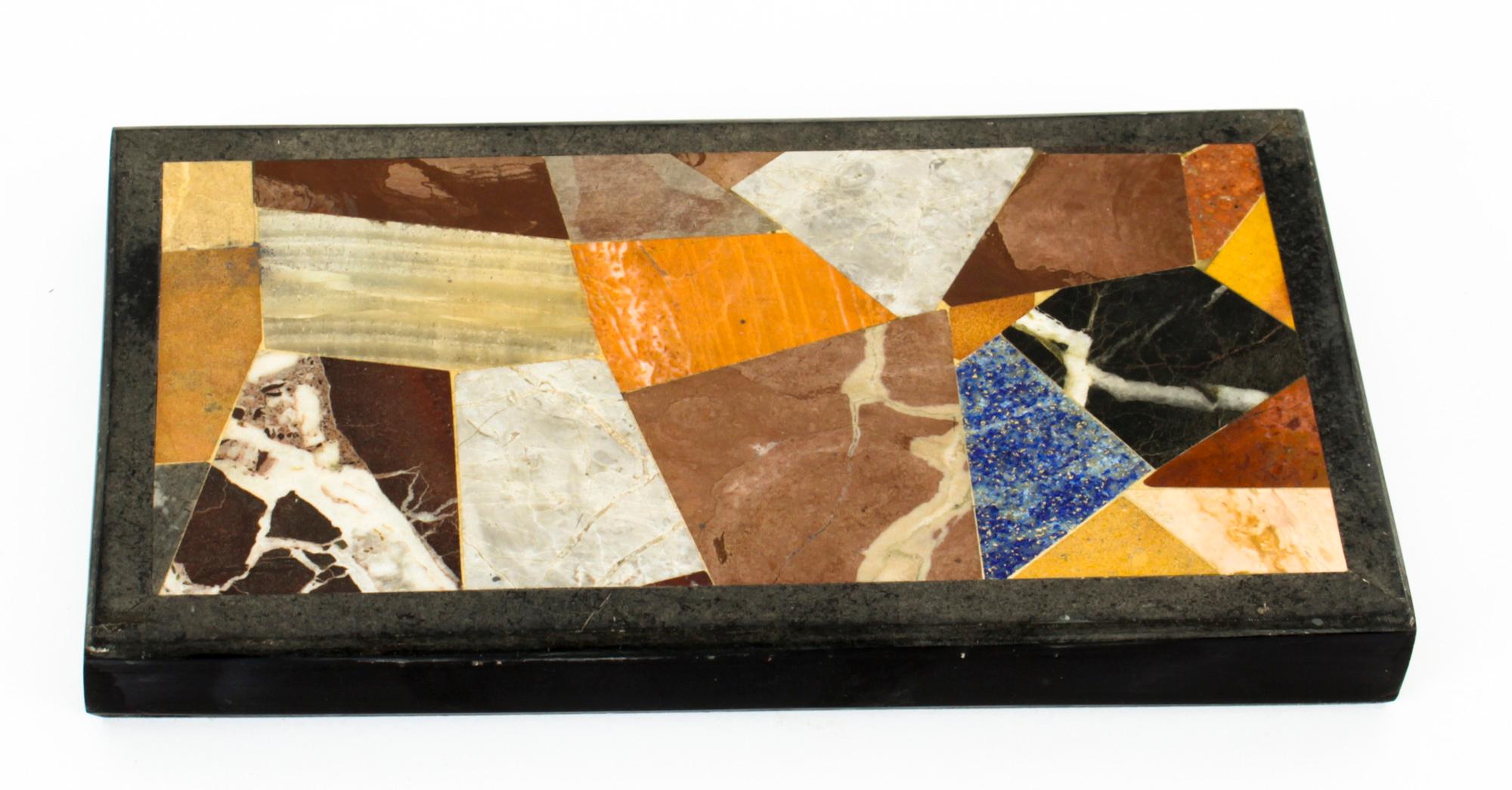 This is a superb decorative antique Italian Grand Tour marble Pietra Dura mounted desk paperweight, circa 1880 in date.
 
This splendid rectangular paperweight is exquisitely inlaid with a sumptuous arrangement of semi-precious stones including