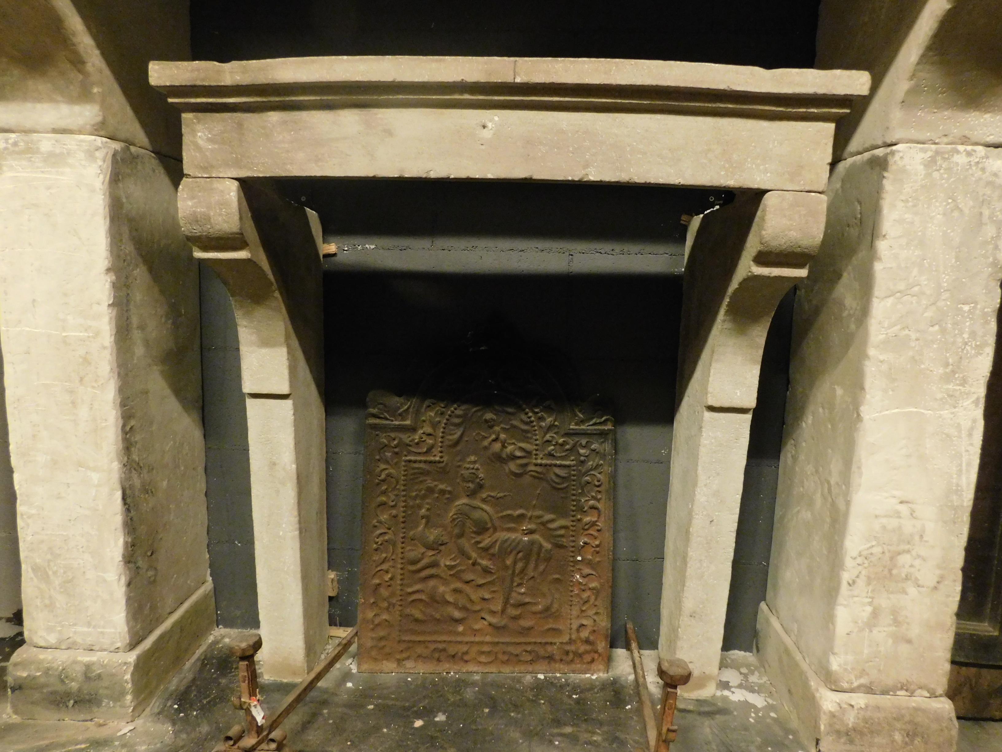 Antique gray stone fireplace, from the Florence area, pietra serena, an Italian detail, has moving legs, typical of the '1700 in Italy, certainly hand carved by craftsman, very sober and elegant was in a historical context of central Italy