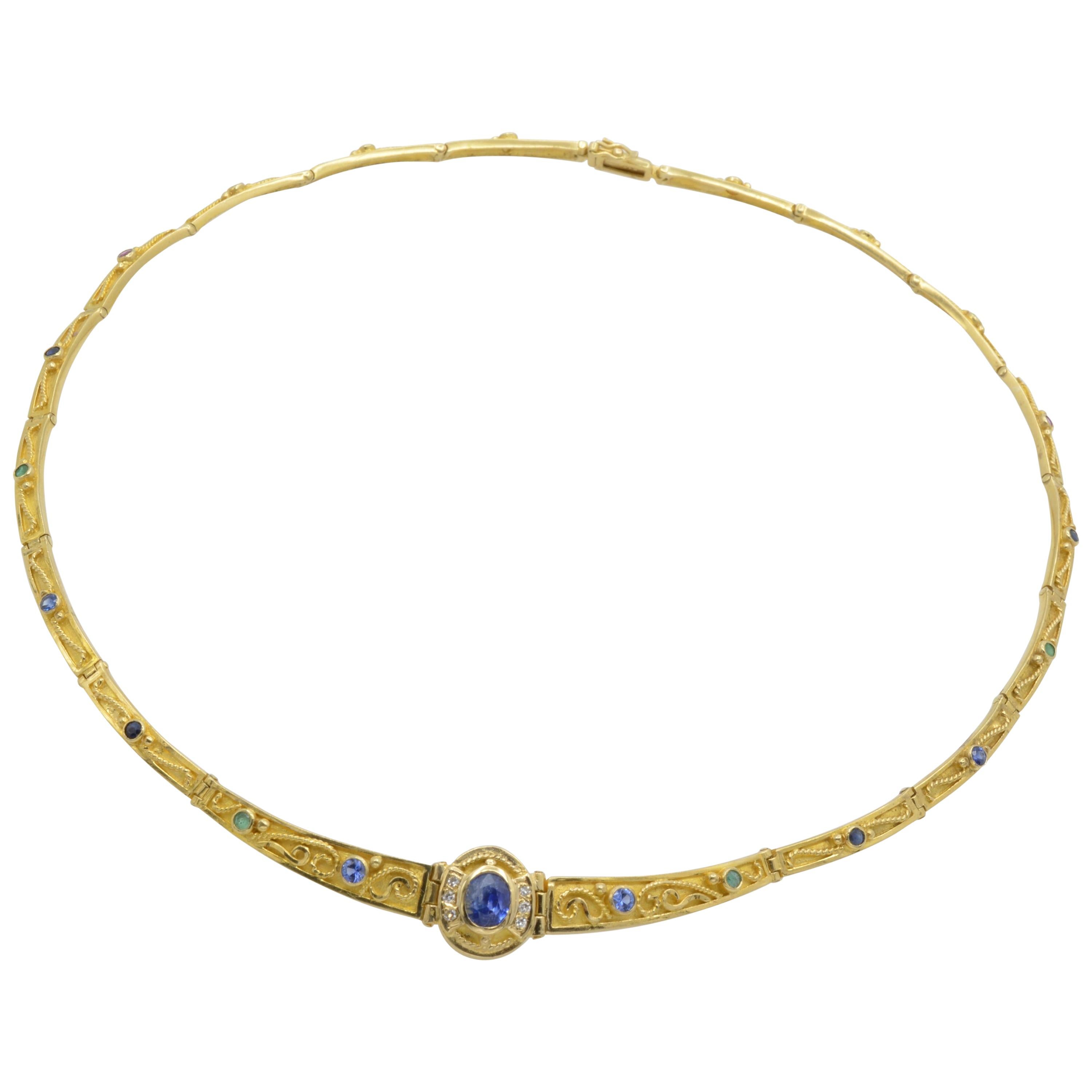 Collier à maillons articulés grecs en or 18 carats et saphirs