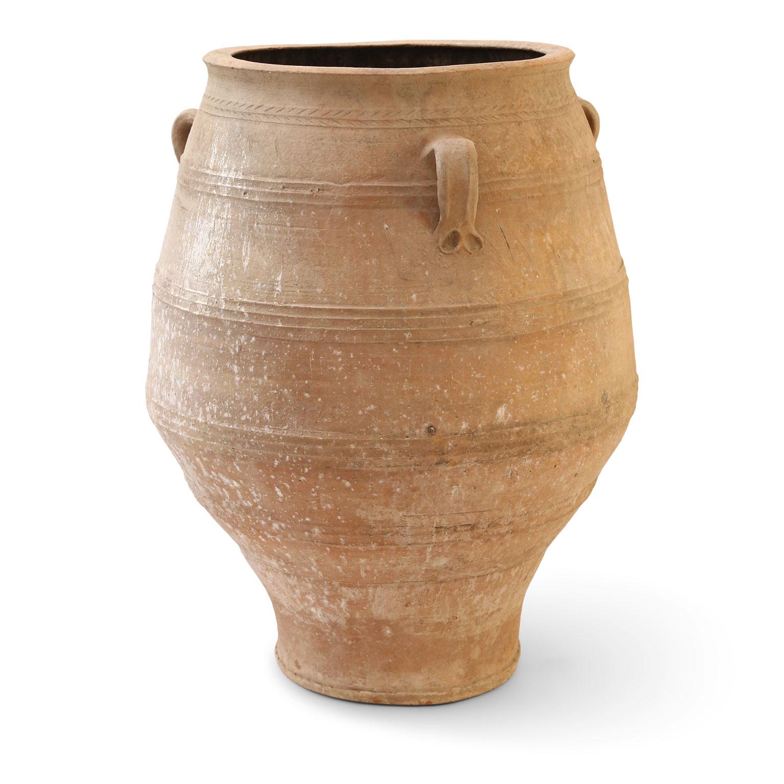 Antique Greek terracotta olive jar. Hand-sculpted ribbed Amphora in terracotta, early 20th century.