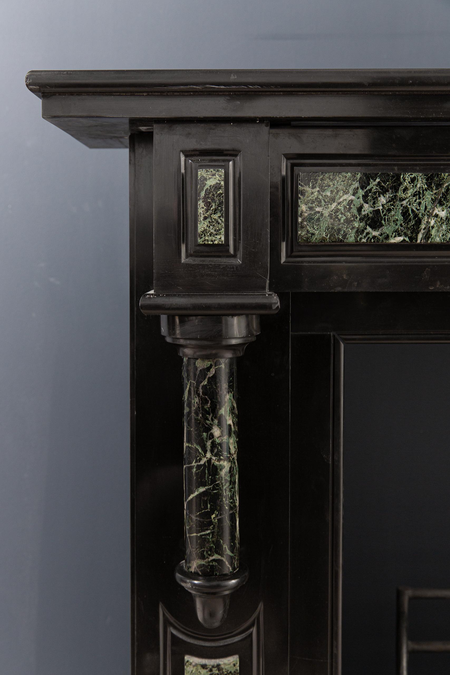 Hand-Carved Antique Green and Black Marble Circulation Fireplace For Sale