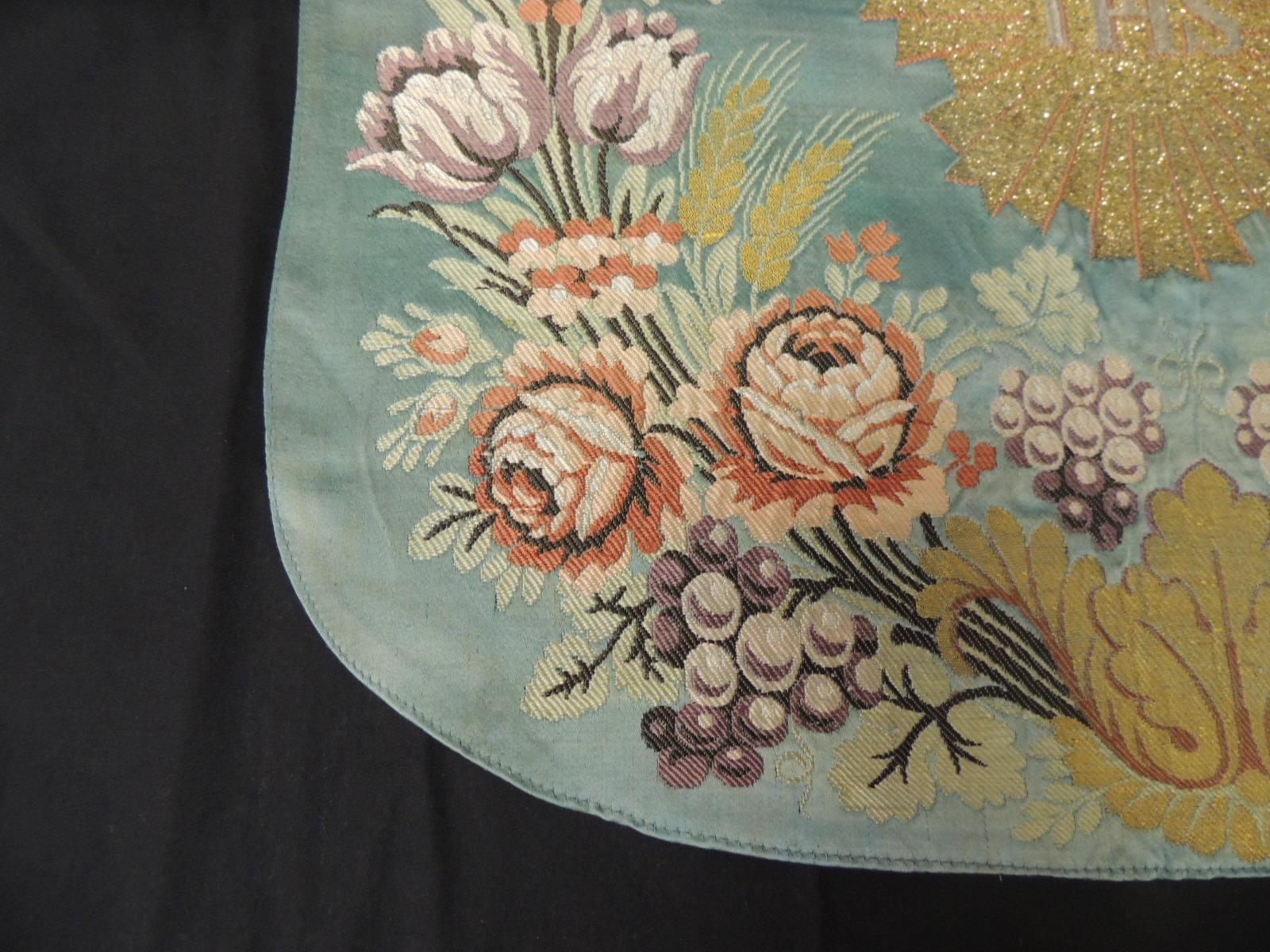 Antique reen and gold ecclesiastical embroidery altar cloth or banner.
Woven silk textile with grapes, floral pattern and the middle gold embroidery metallic threads
with initials. (I.H.S.)
In shades of gold, green. pink, white, red, pink and