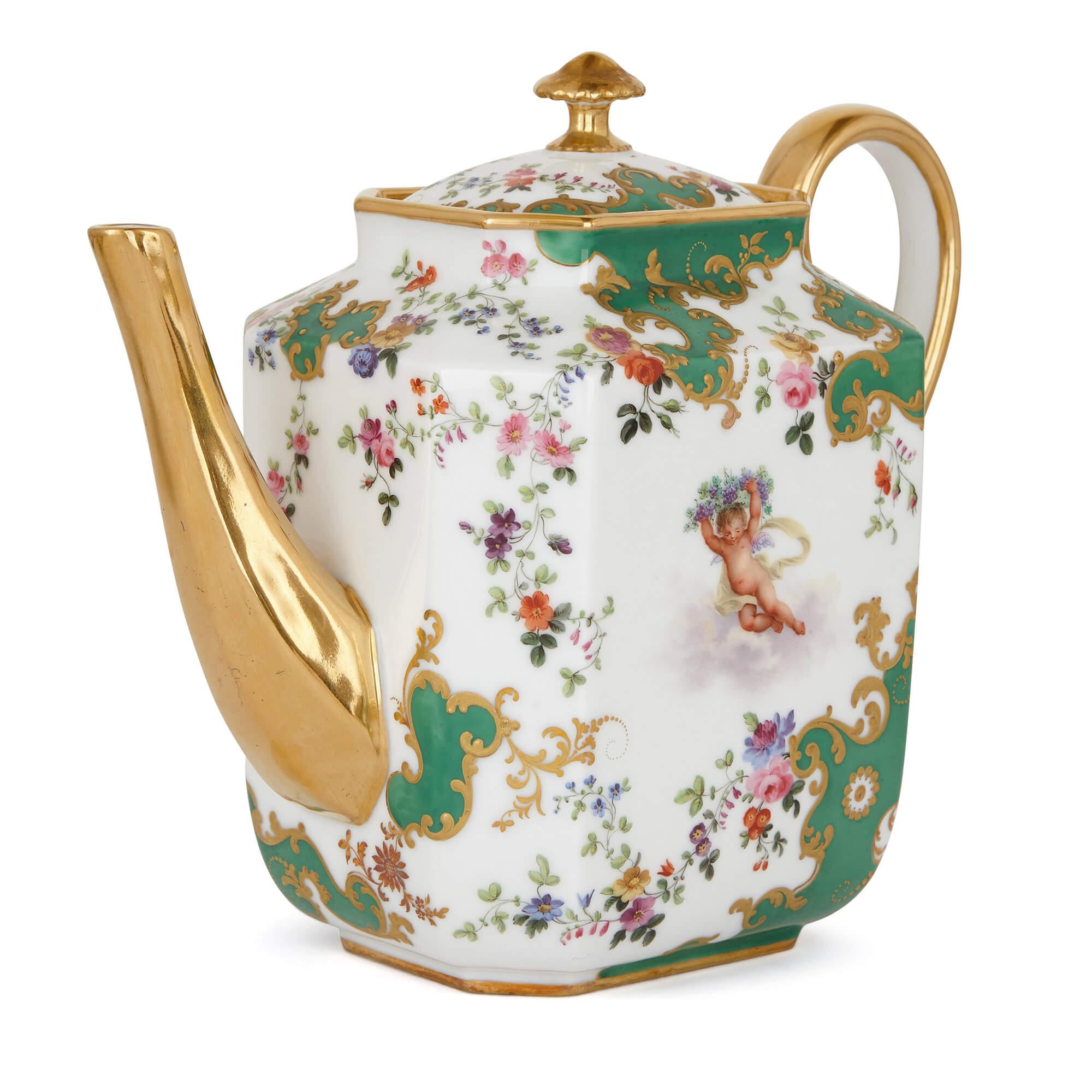 This attractive porcelain tea service possesses a wonderful 19th century charm, thanks to its finely-detailed sevres-style decorations and stylish green and white color scheme. There are 23 pieces in total, including a teapot, a milk jug, a sugar