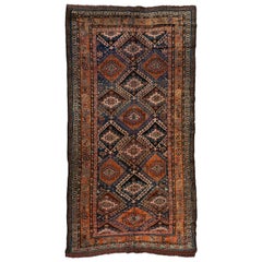 Antiker geometrischer persischer kurdischer Teppich mit grünem und blauem Stammesmotiv, ca. 1920er-1930er Jahre