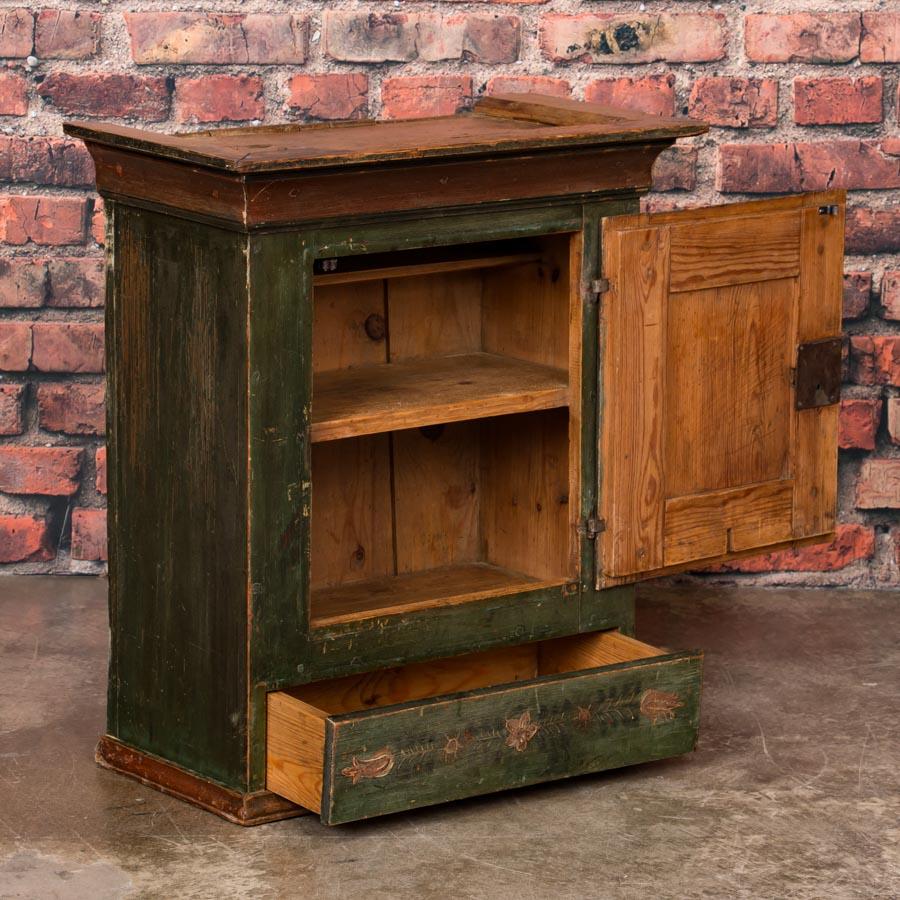 antique green cabinet