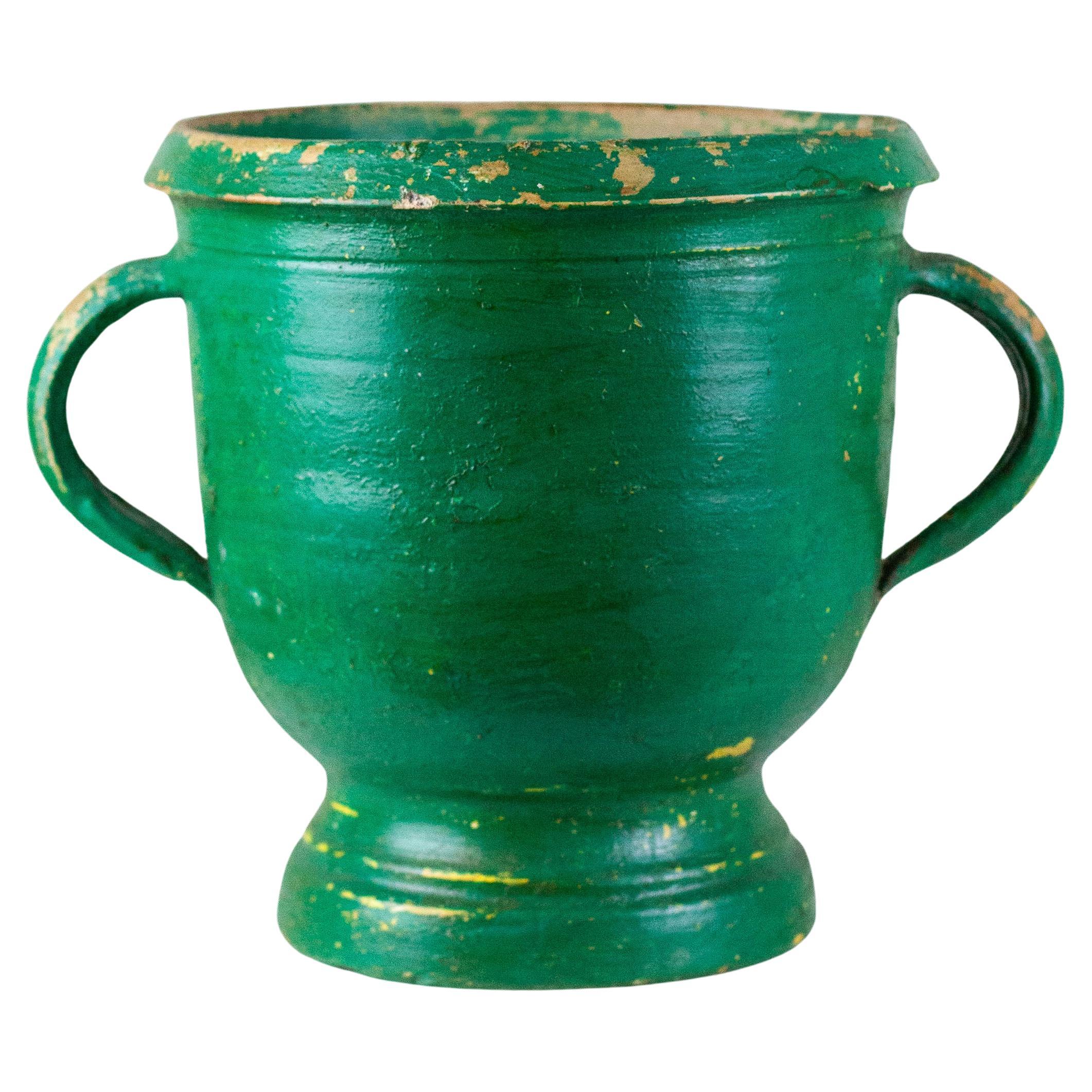Antike grüne französische Urne