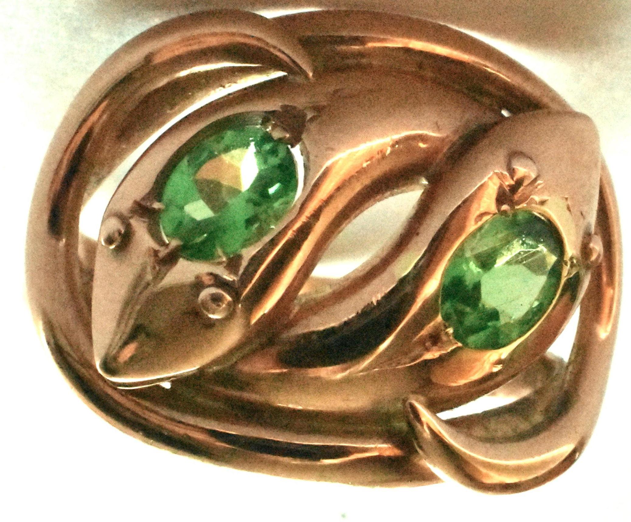 Substantial 9k double headed snake ring with unusual demantoid (green garnet) eyes, hallmarked 