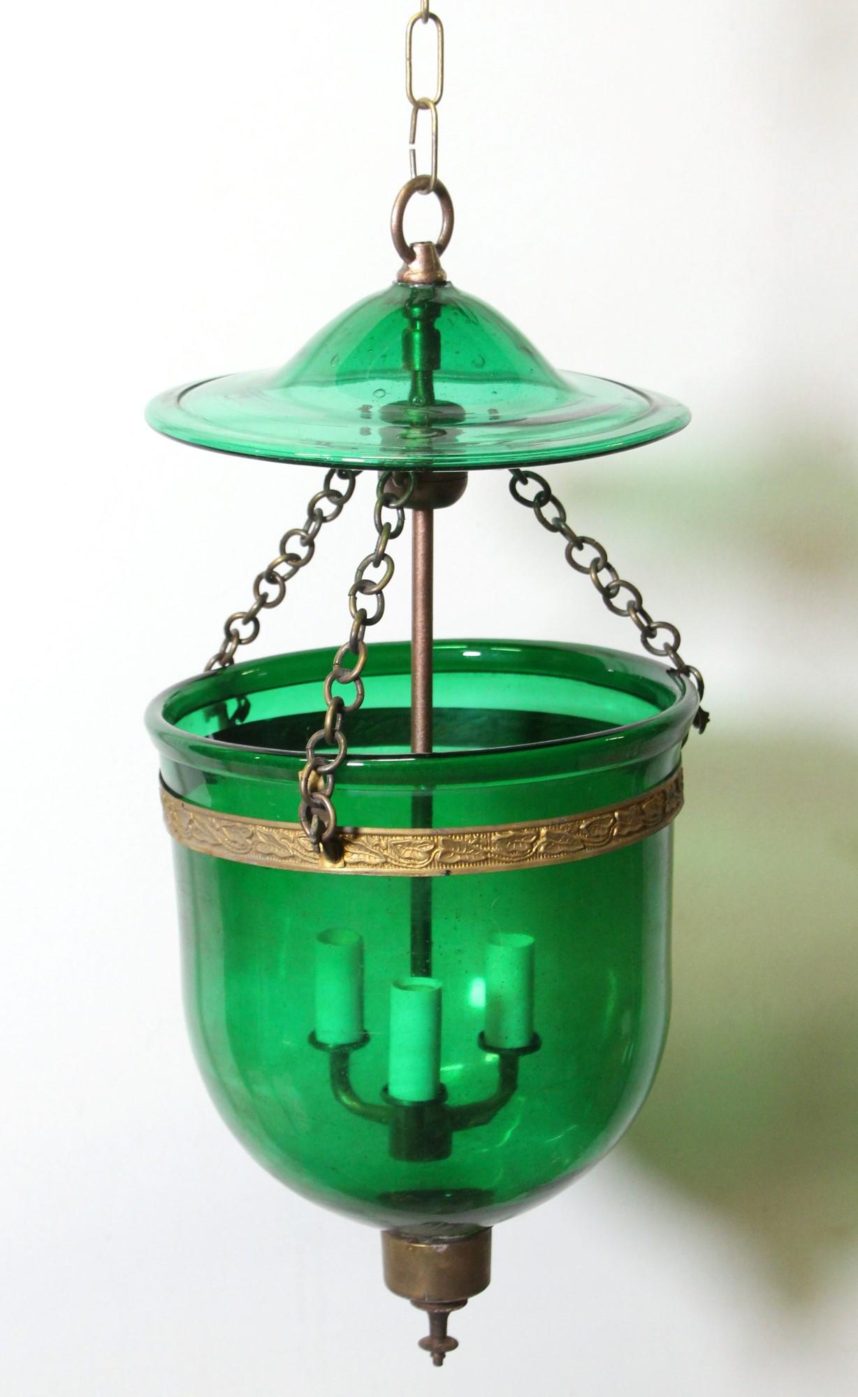 Antique original hand blown green crystal bell jar pendant light with brass hardware and a matching lid. Made in Belgium by Val Saint Lambert. Stamped 