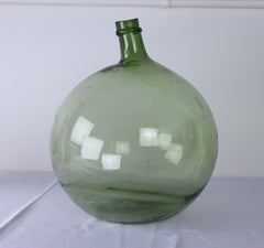 Antique Green Glass Demijohn Bottle - A