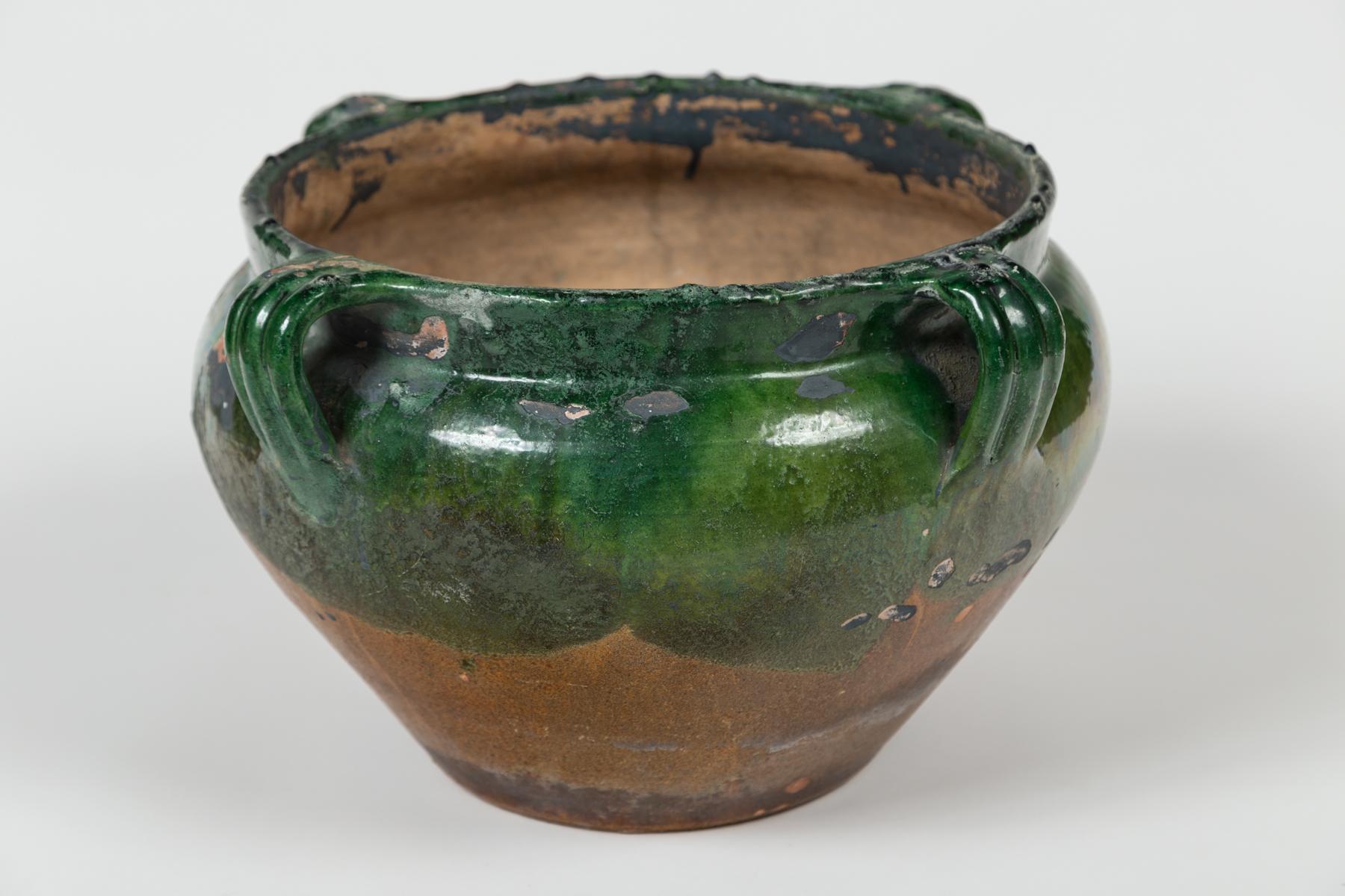 Antique Green Glazed Terracotta Planter, Provence, France, early 20th Century. Beautiful variegated green glazed pot with four handles.
