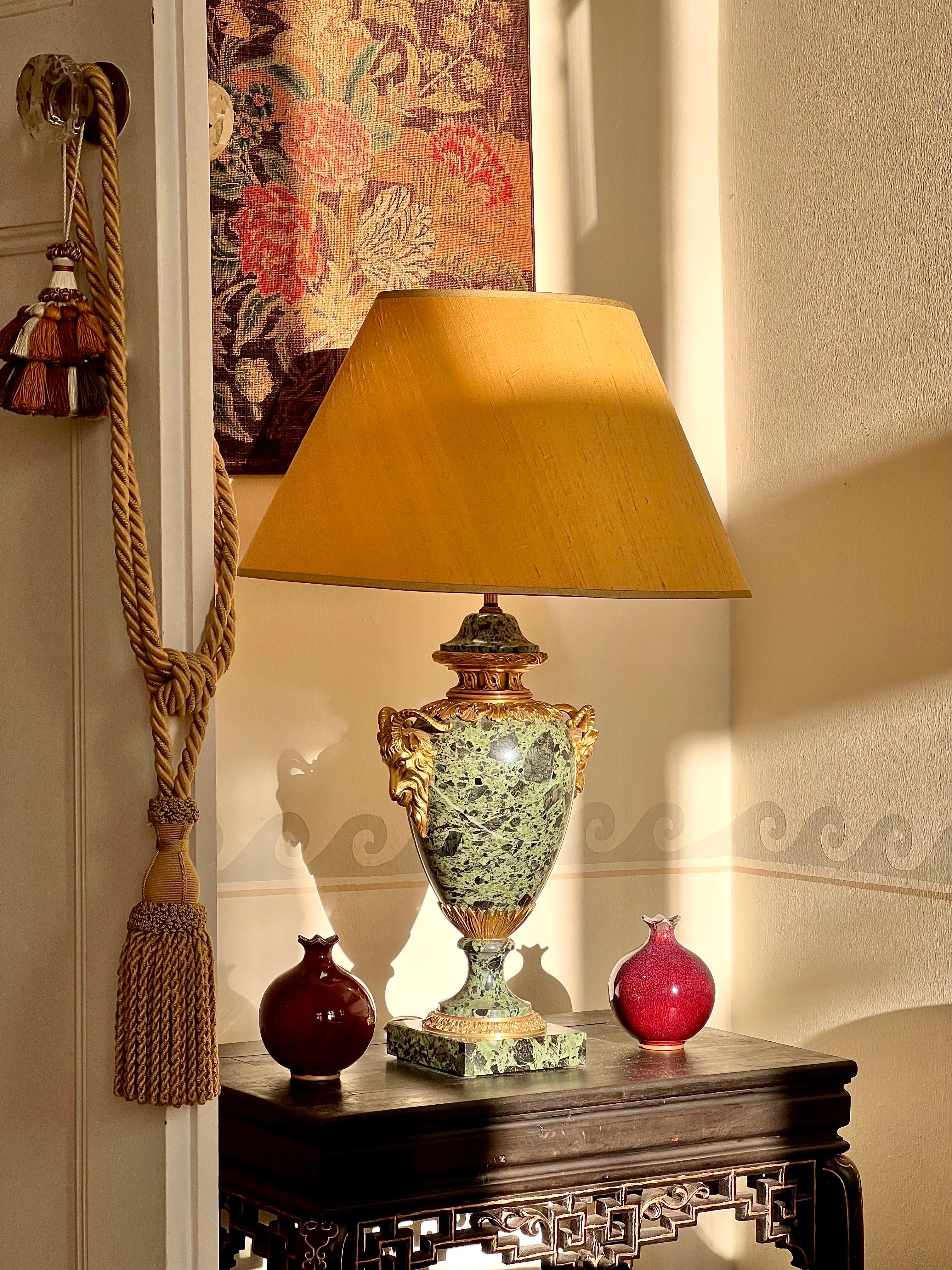 A superb quality gilt bronze mounted urn in breccia verde d’Egitto marble, now fitted as table lamp.
France or Italy, late 19th – early 20th century.

Why we like it
Rare and very decorative marble, superbly cast and chased gilt bronze mounts; a