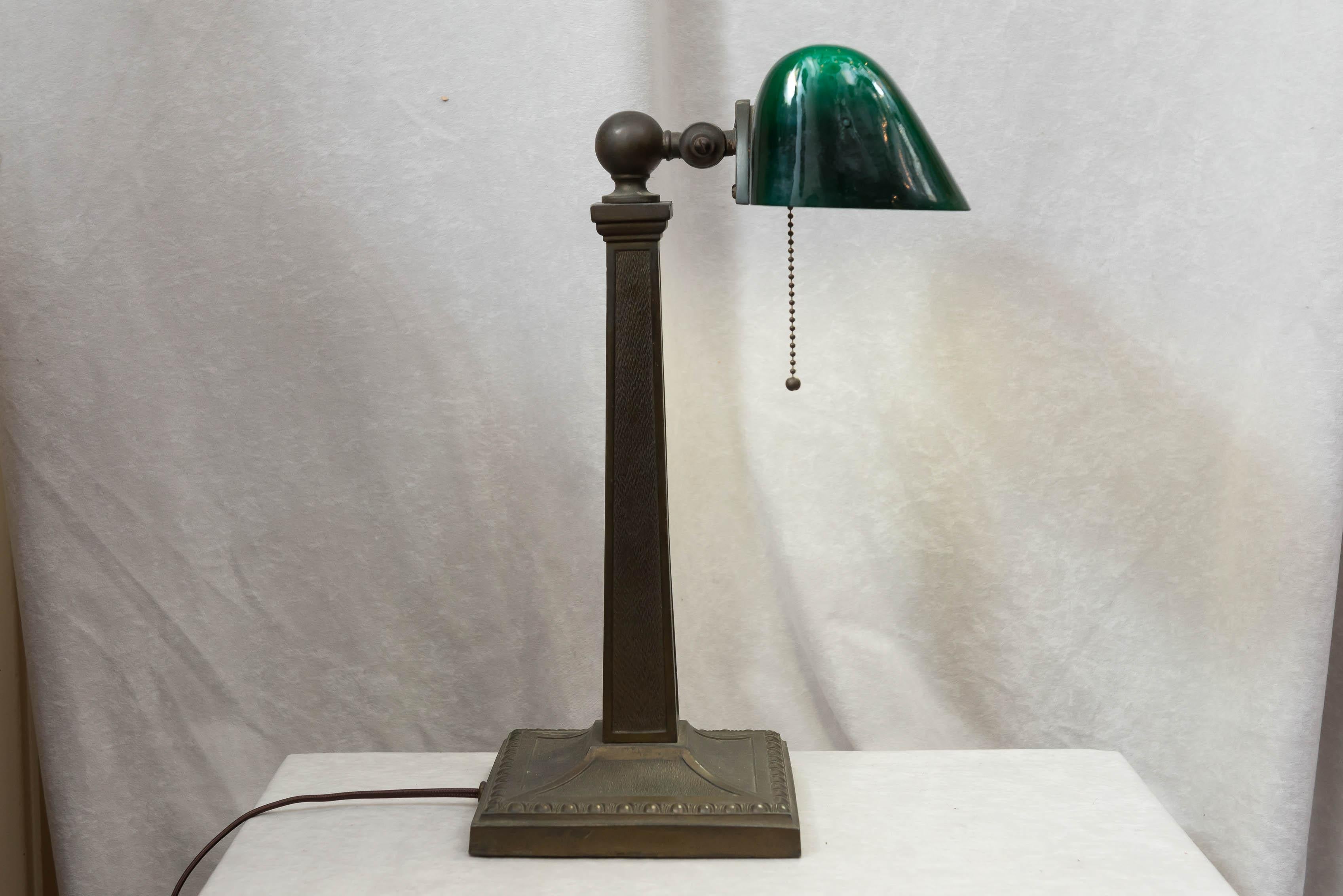 These period banker's lamps are one of our most popular items. They are useful and beautiful, and besides, the reproductions are pure garbage.
 This example is signed Amronlite, one of the more popular companies along with Emeralite, and Verdelite.
