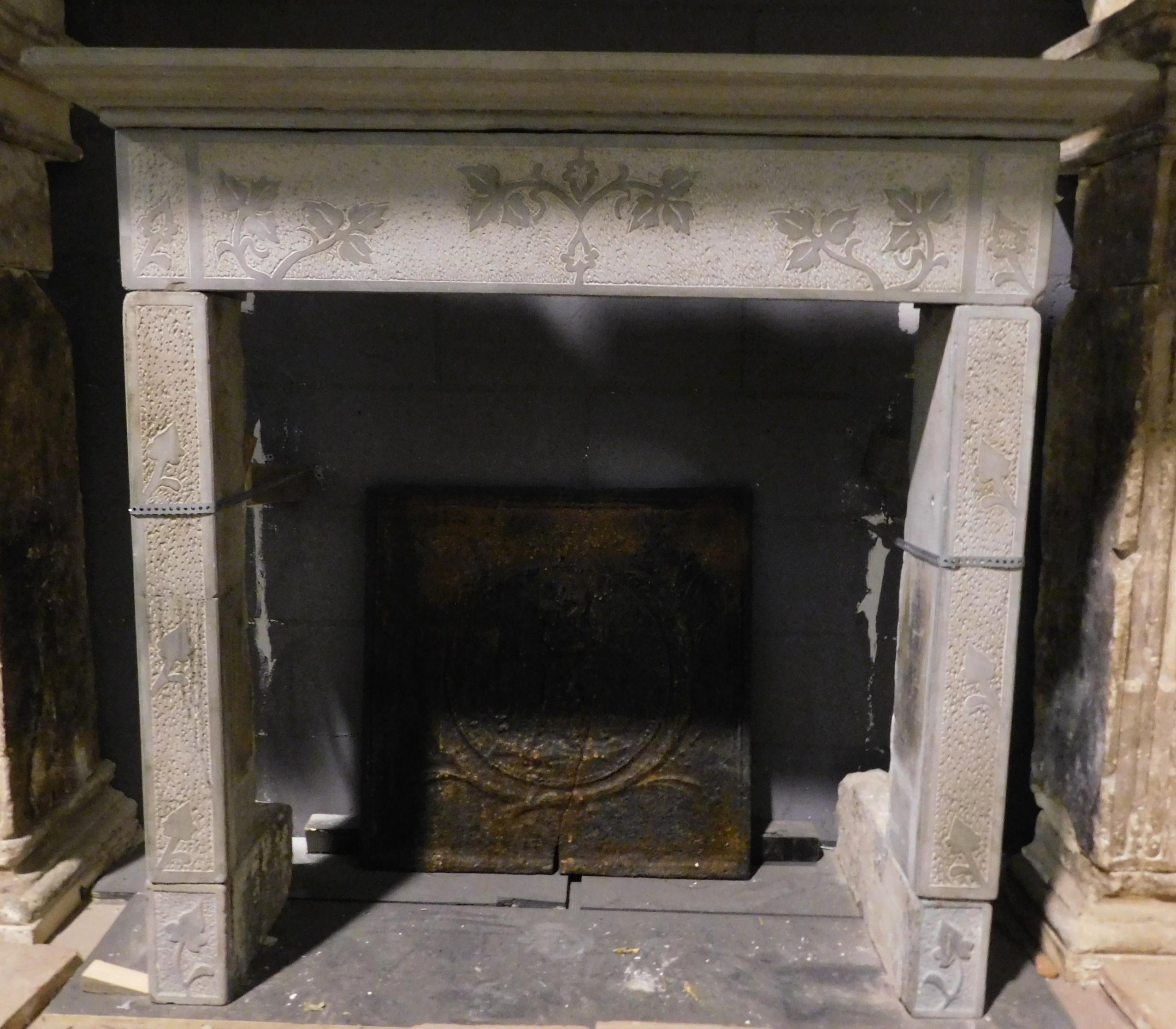 Antique gray stone fireplace mantle, carved in bas-relief with plant shapes and leaves, built and hand-sculpted in the late 1700s for a palace in central Italy.
Beautiful fireplace mantle, ideal both in rustic contexts for stone and in more modern