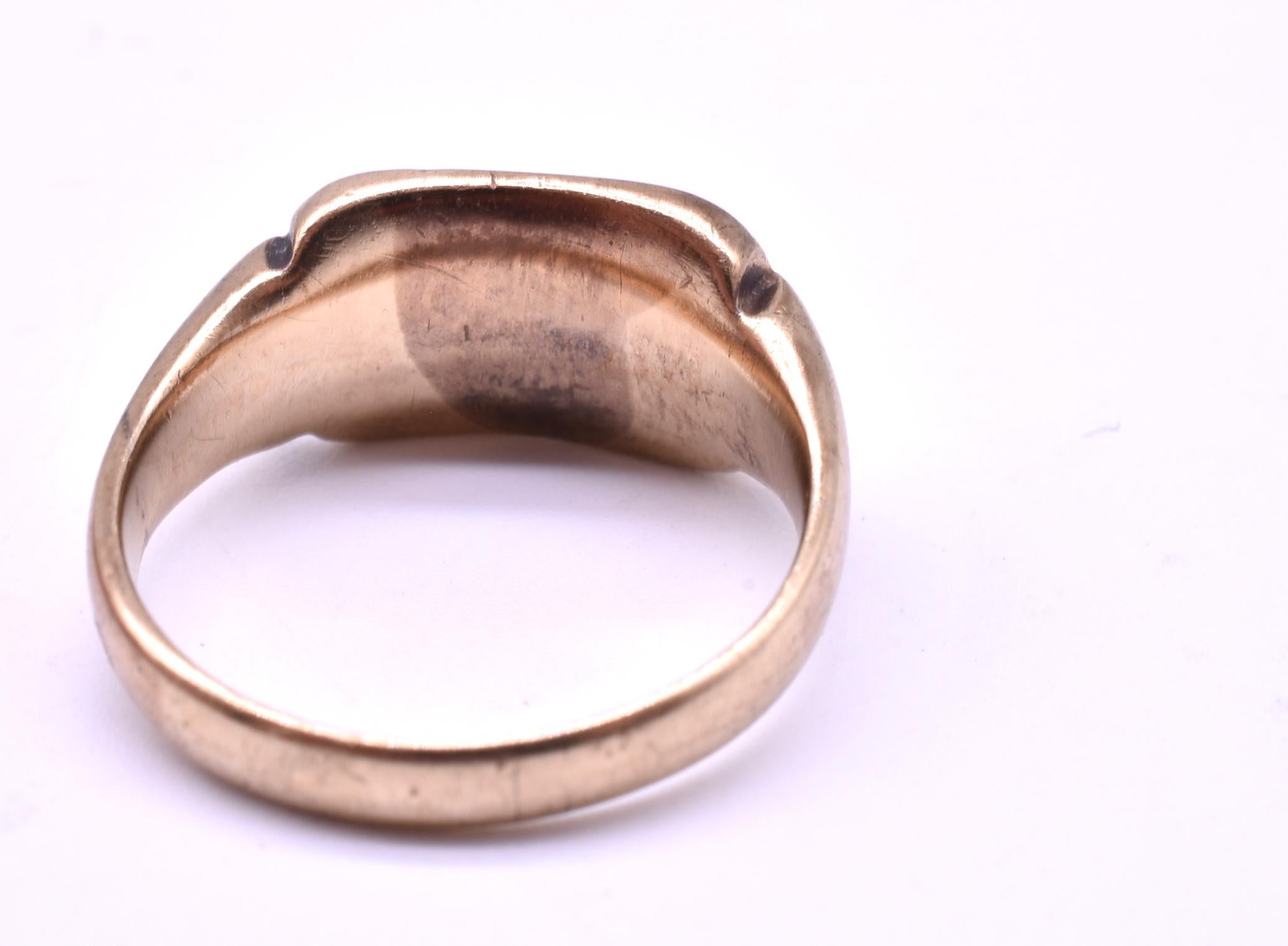 A wonderful early 20th century dog (Greyhound/Whippet) signet ring for the greyhound dog owner in your life. This adorable signet ring is 9k yellow gold and displays an adorable etching of a greyhound pushing a toy. Dogs were a symbol of fidelity