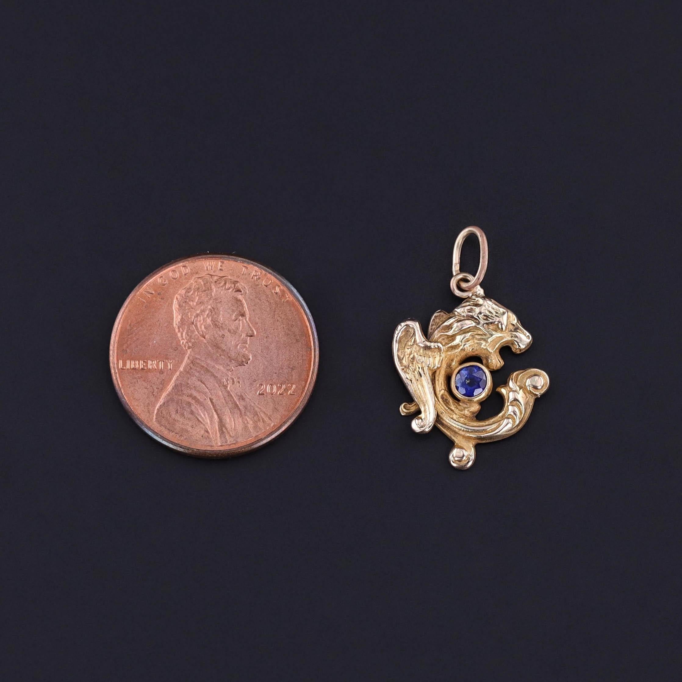 Mythical Elegance: Antique Griffin Charm in 10k Gold with Sapphire Accent, circa 1900

Rich in symbolism and beautifully rendered, this antique charm (circa 1900) features a finely detailed griffin—an ancient emblem of strength, courage, and