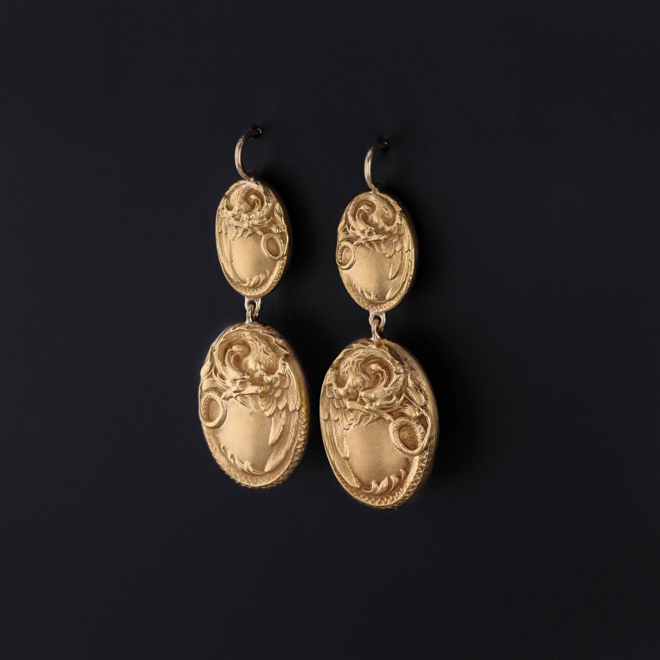 Antique Griffin Earrings in 14k Gold – Transformed Edwardian Cufflinks, Circa 1910

A captivating fusion of strength and elegance, these antique earrings showcase powerful griffins—mythical guardians of treasure—rendered in warm 14k gold. Originally