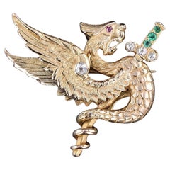 Spilla antica con grifone in oro 14k