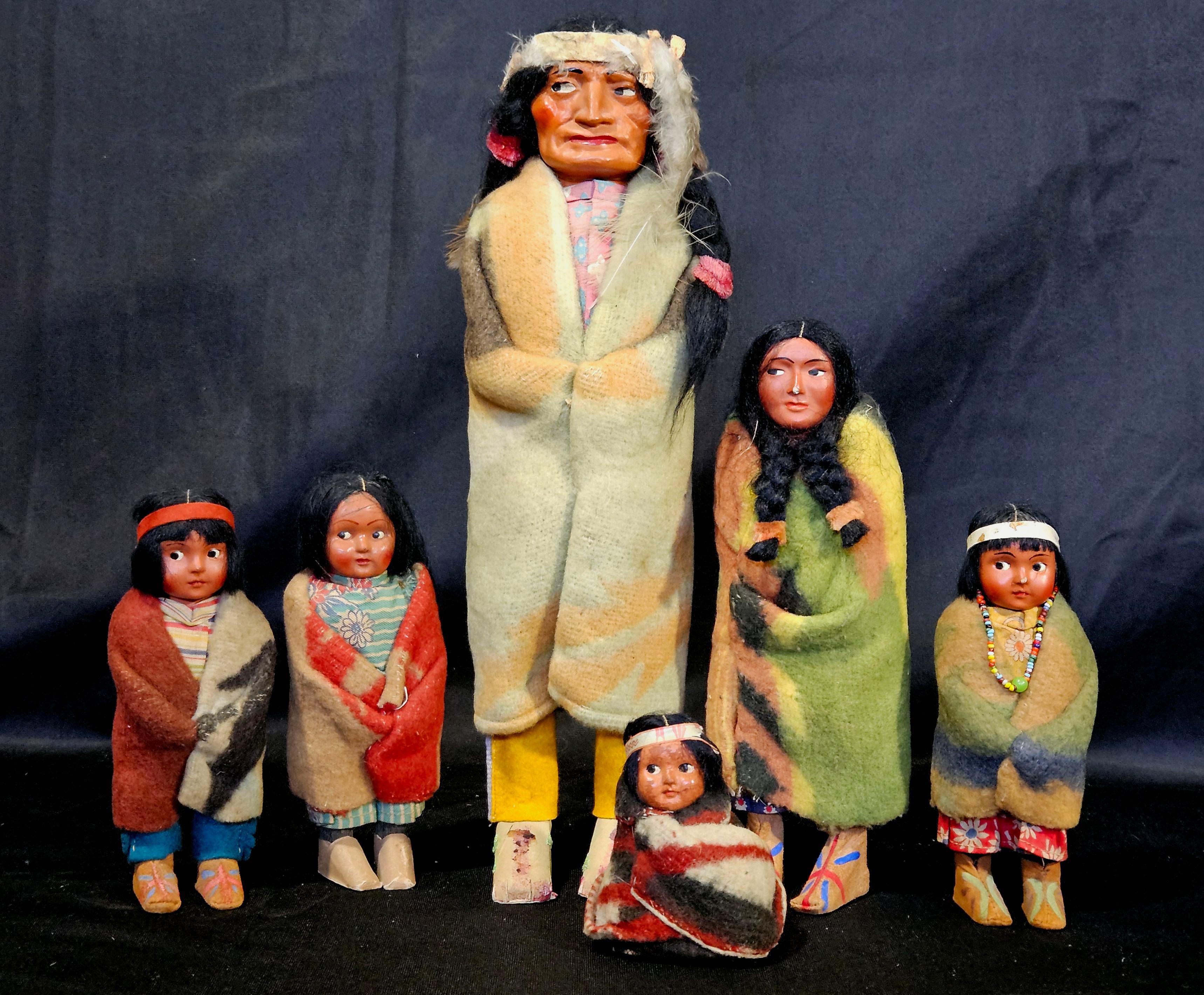 A Skookum doll was a Native American-themed doll, sold as a souvenir item in the early 20th century.
They are all in different sizes. The last photo shows the dimensions (inch) of each doll, W (width) x H (height) x D (depth).
The original labels