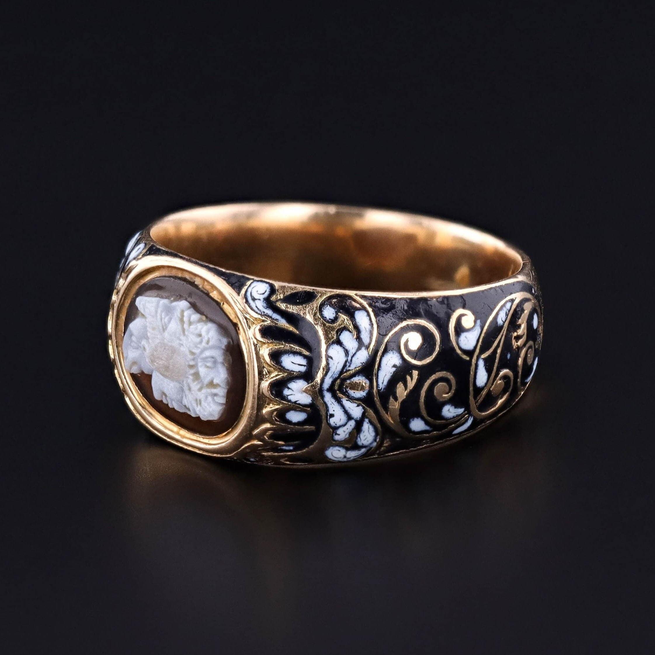 Antique Renaissance Revival Cameo Ring: Explore the exquisite craftsmanship of this antique Renaissance revival ring (circa 1850), featuring a cameo of a gryllos, a multi-headed animal and human composite set in a substantial 18k gold mounting