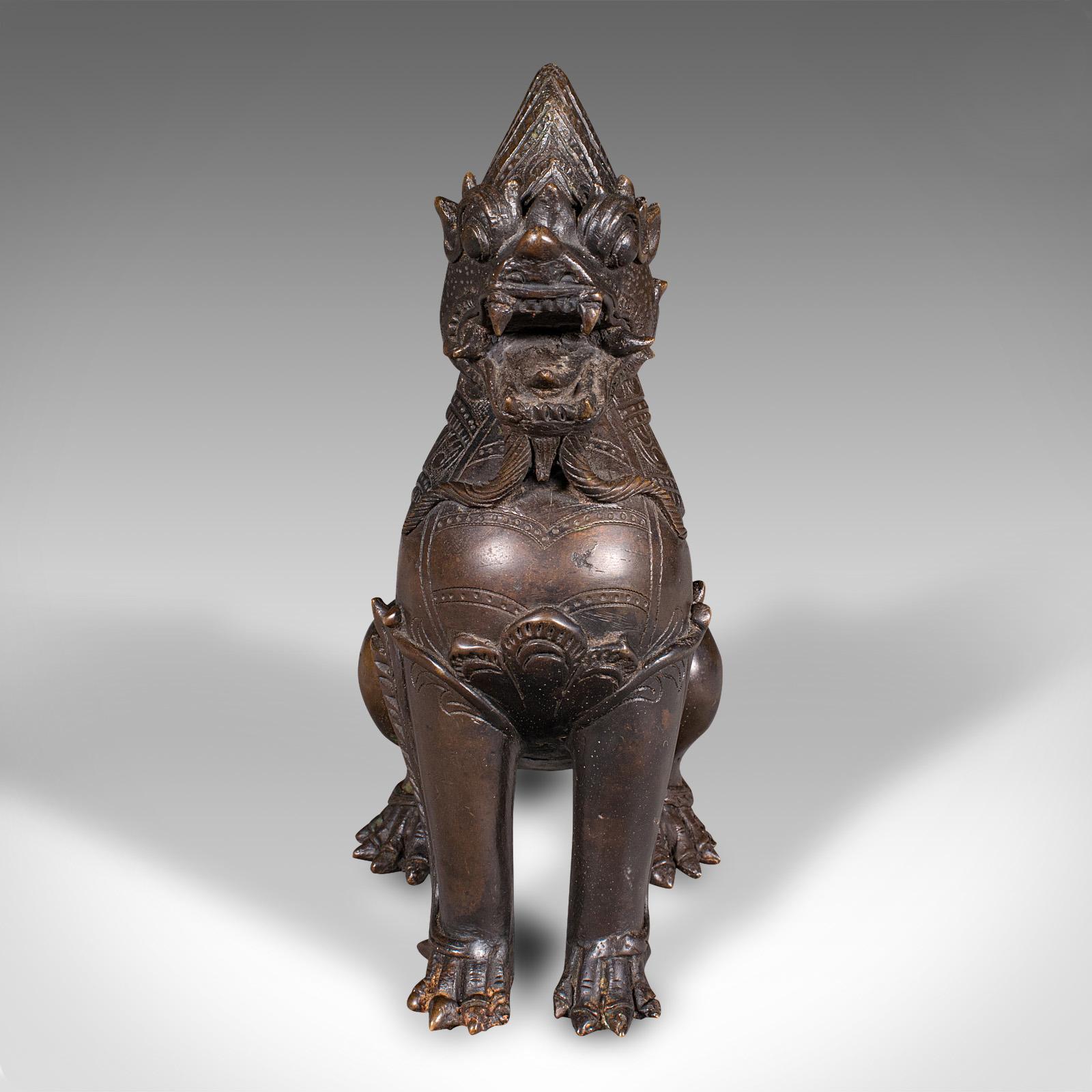 
This is an antique guardian lion figure. A Chinese, bronze Buddhist icon ornament, dating to the Victorian period, circa 1880.

A striking icon figure, with fascinating detail and form
Displays a desirable aged patina and original order