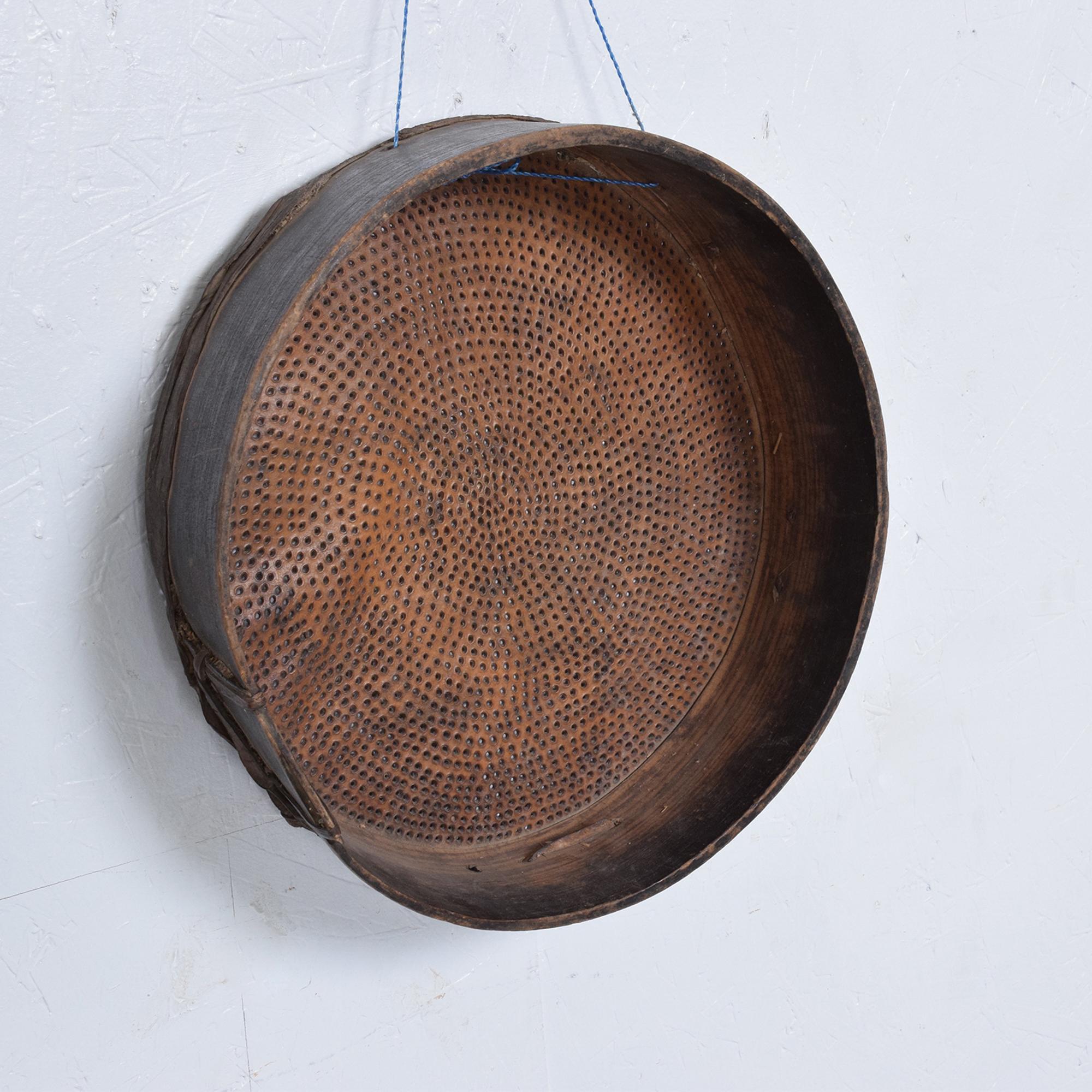 Farm Tool
Antique Goatskin Bentwood Flour Sieve Primitive Strainer Sifter Kitchen Ware Farm Tool from Guatemala,1800s.
Lovely decorative piece with tons of charm.
15 in diameter x 4 h inches
Wear consistent with age and use. Minor structural