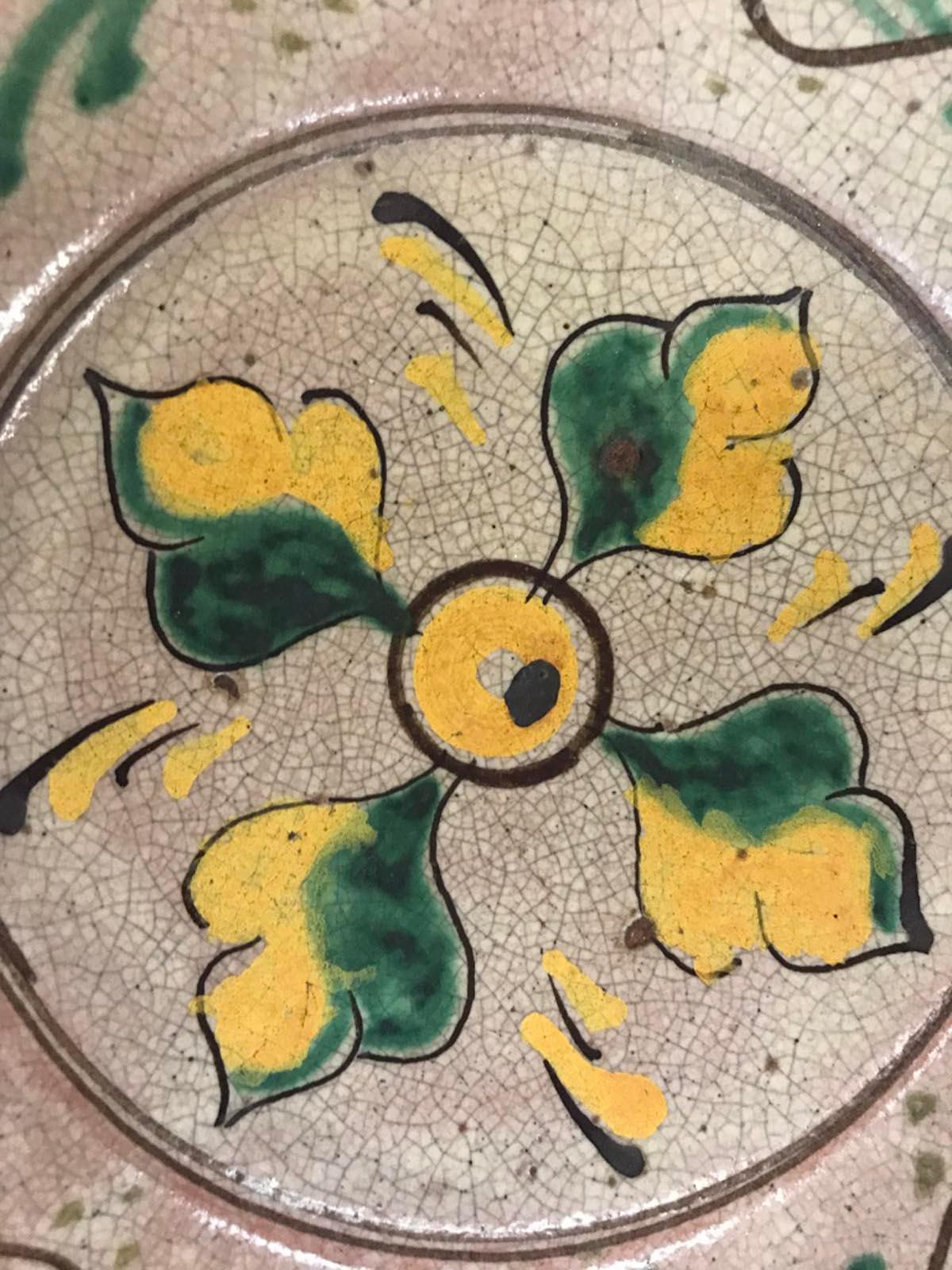 Ceramic plate made by the Montiel factory in Antigua Guatemala. All plates from the Montiel factory are handmade, glazed and decorated and fired in wood ovens. These plates are considered Guatemalan Majolica. Made in the 1930s-1940s. Each comes with