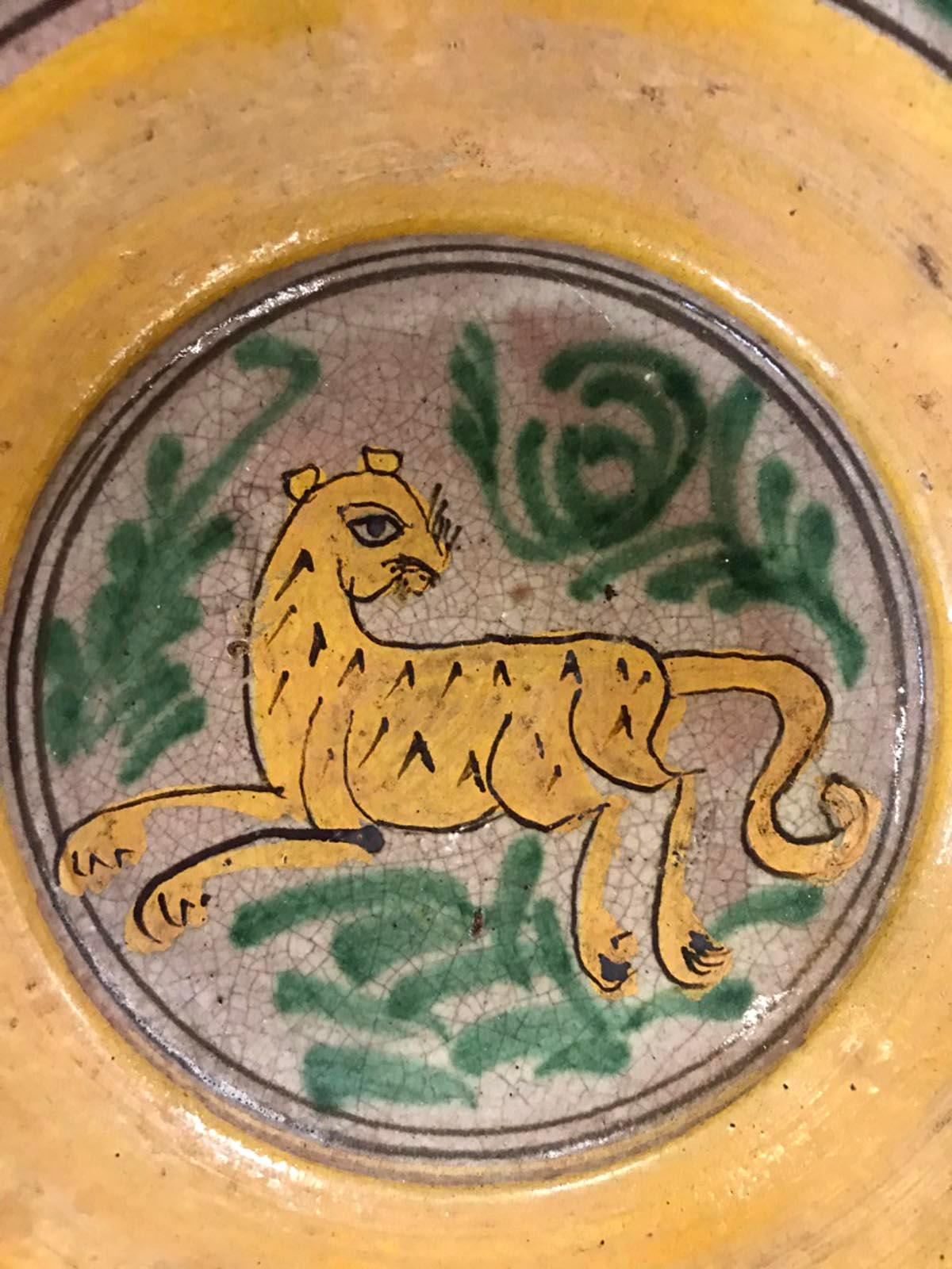 Ceramic plate made by the Montiel factory in Antigua Guatemala. All plates from the Montiel factory are handmade, glazed and decorated and fired in wood ovens. These plates are considered Guatemalan Majolica. Made in the 1930s-1940s. Each comes with