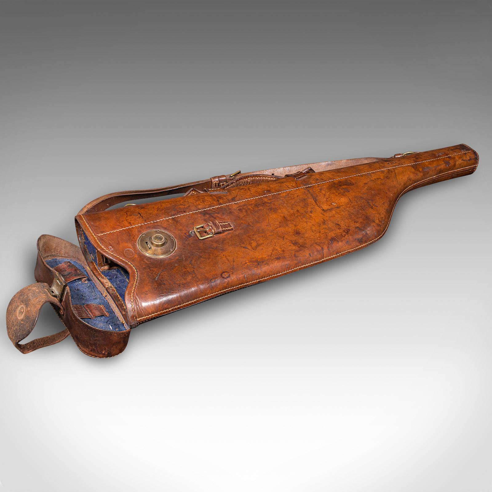This is an antique gun slip case. An English, leather leg of mutton shotgun or rifle sleeve, dating to the late Victorian period, circa 1900.

Superb, antique country pursuits gun case in traditional form
Displays a desirable aged patina an din good