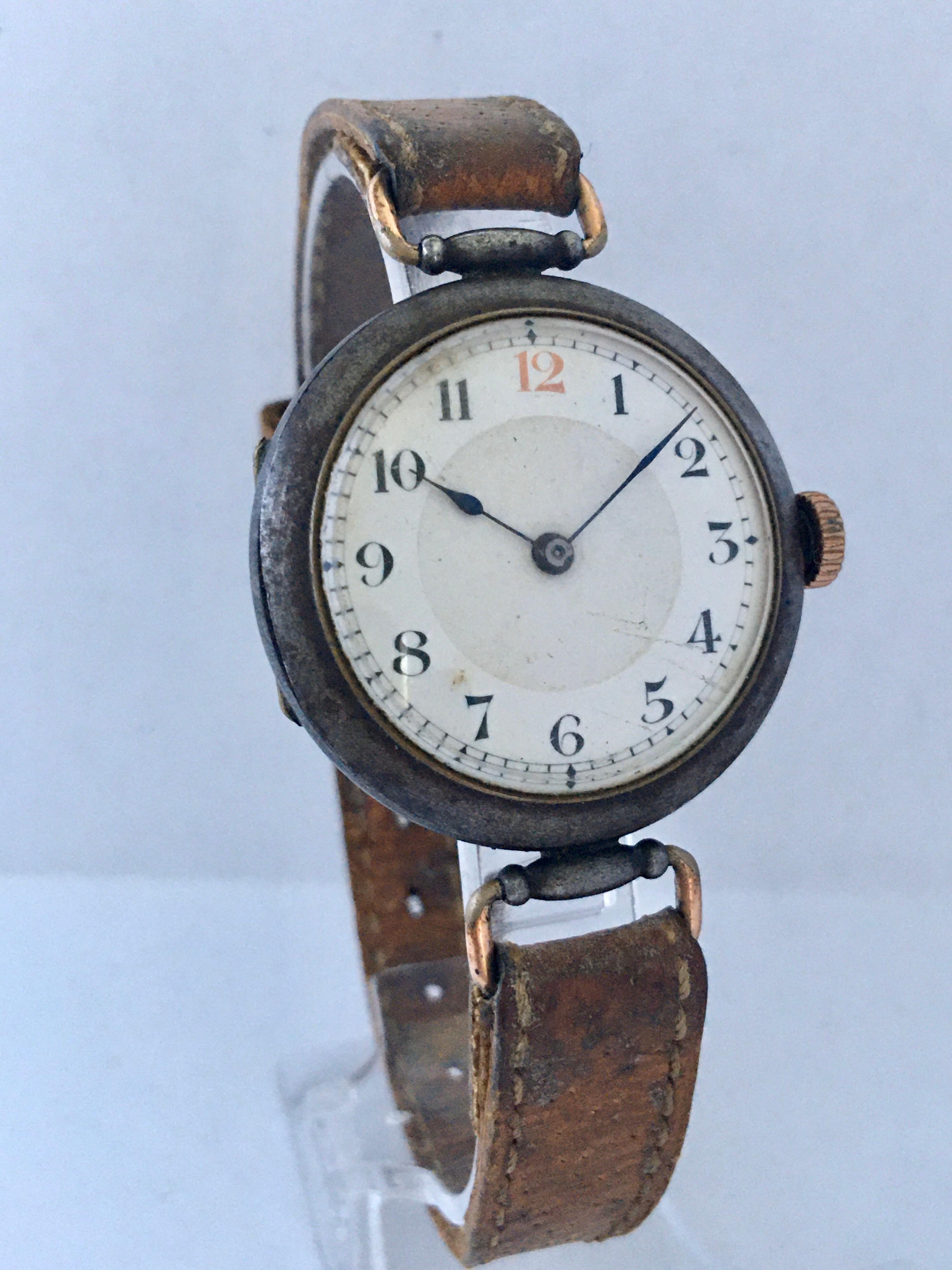 This beautiful antique transition mechanical watch is in good working condition and it is ticking well. The gunmetal(hunting) case is a bit tarnished and its old brown leather strap is worn but wearable the gold plated buckle strap is tarnished as