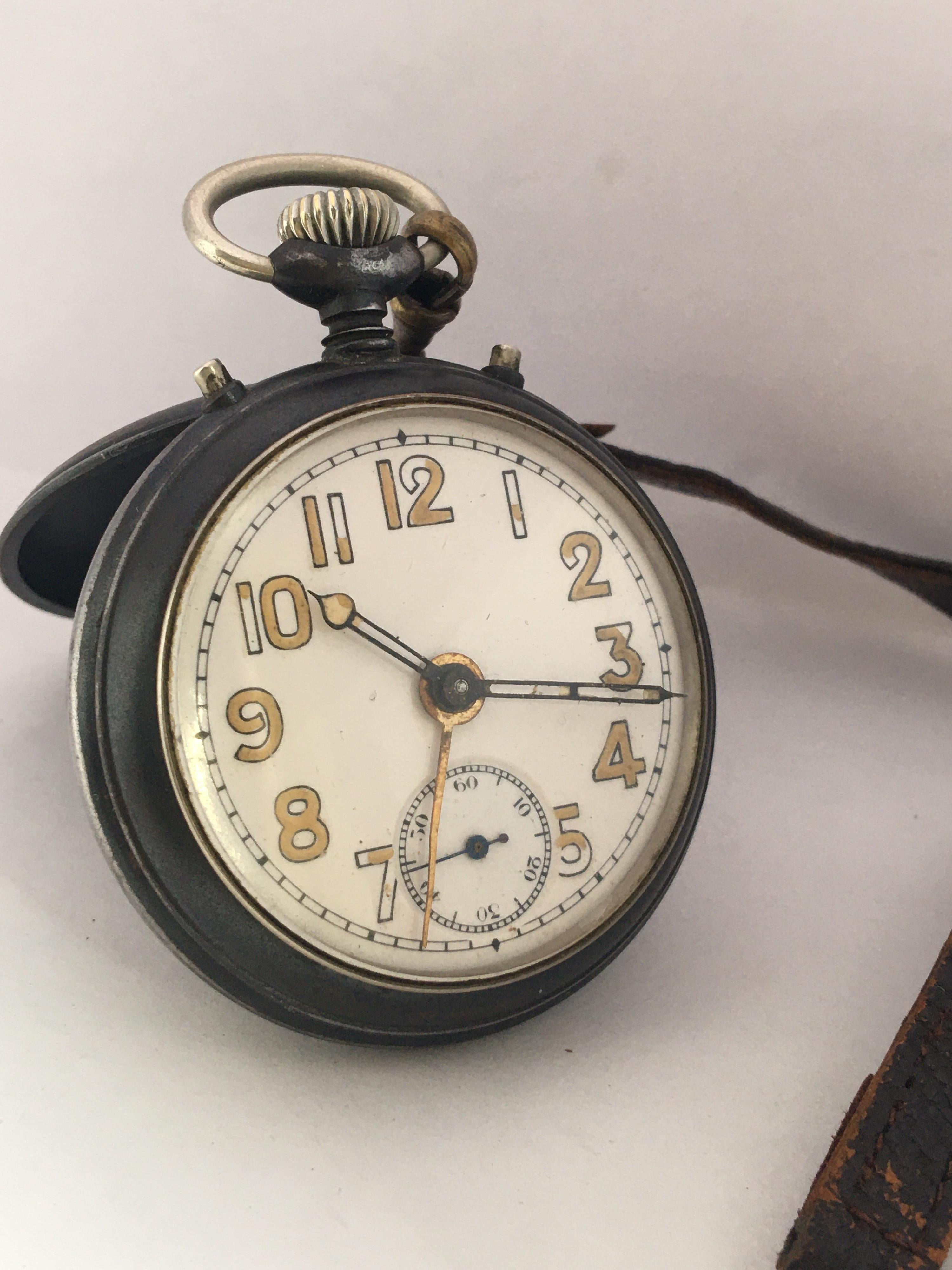 This beautiful pre-owned antique hand winding travel alarm clock / pocket watch is in good working condition and it is running well. Visible signs of ageing and wear with light scratches and tarnishes on the 53mm diameter ( excluding crown) watch