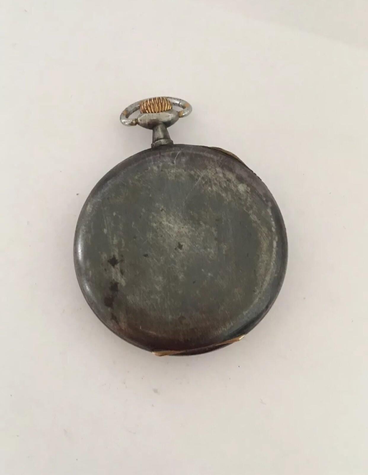 Antique Gunmetal Pocket Watch Working.


This beautiful 50mm diameter keyless stem winding mechanical gunmetal pocket watch is in good working condition and it is running well. Visible signs of ageing and wear with tiny and light surface marks on