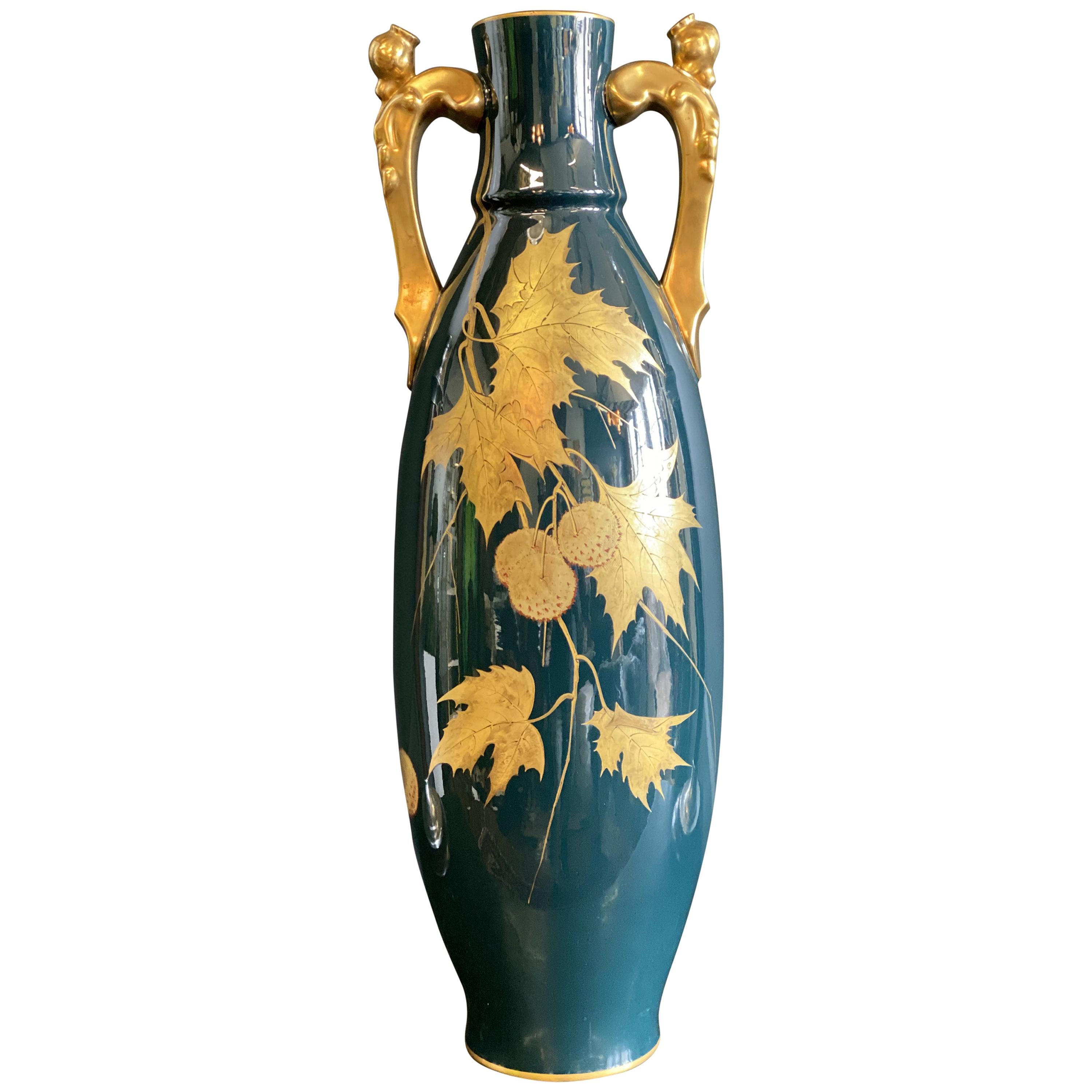 Vase ancien en porcelaine bleu, vert et or de Gustave Asch