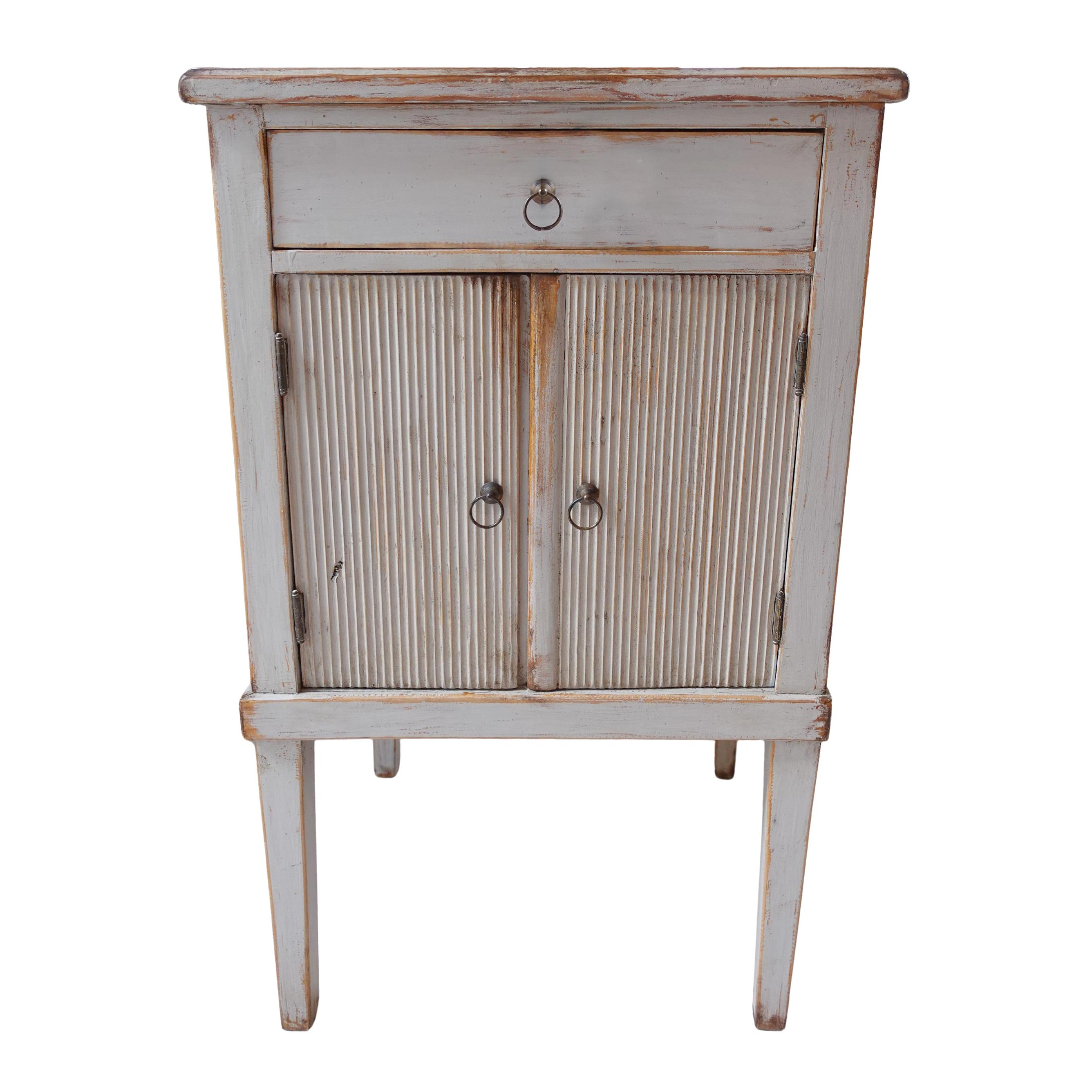 Antique Gustavian Side Table with Distressed Grey-Blue Lime-Washed Finish

Approximate size: 28”H x 16.5”W x 13.75”D

This exquisite antique Gustavian side table captivates with its distressed grey-blue lime-washed finish. The artisan application of