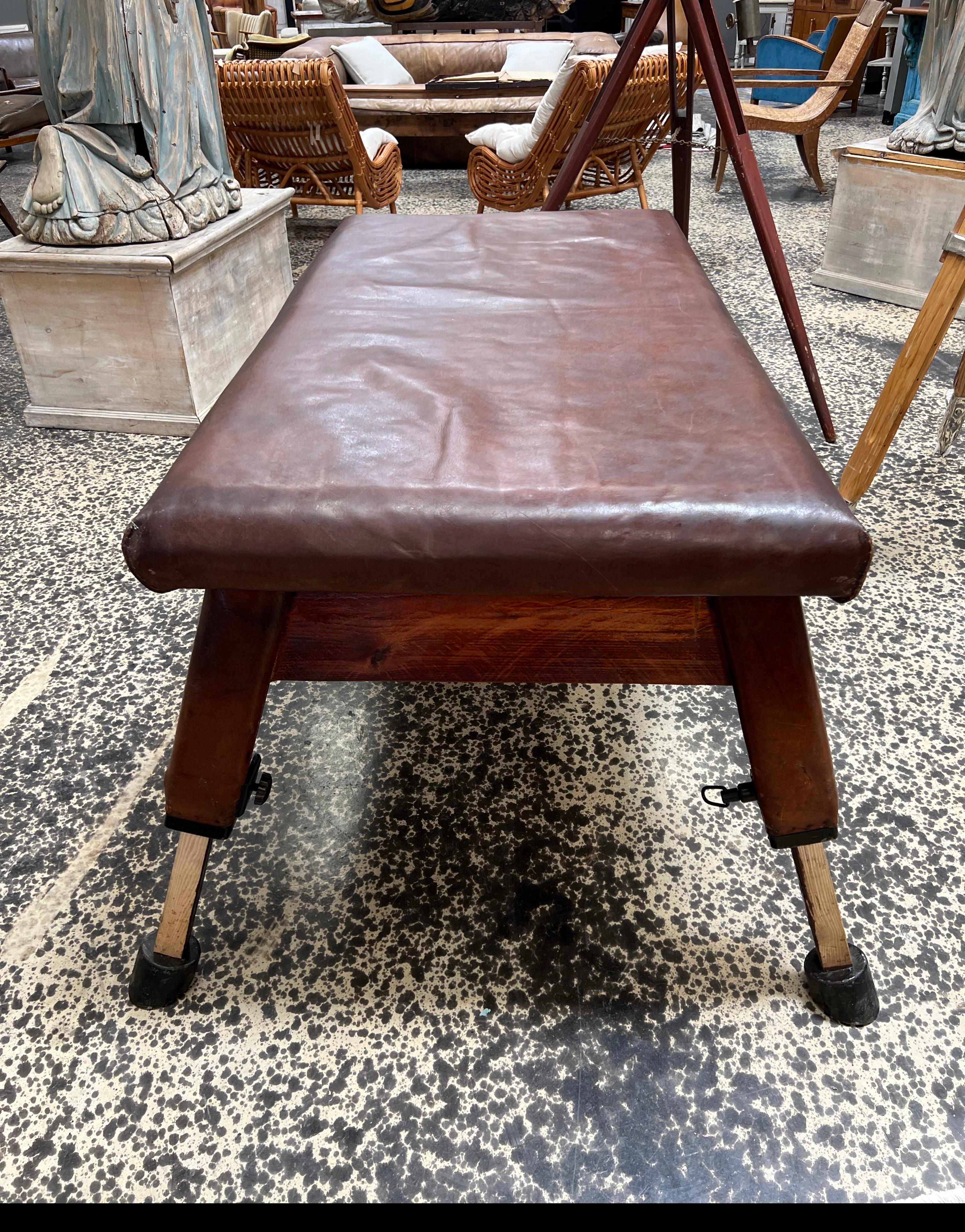 Beautiful antique European gym bench
Full size with excellent patina on both the leather and the wood. The legs are adjustable with easy pins that pull out to slide the legs up and down.
This treasure is rare and amazing.
