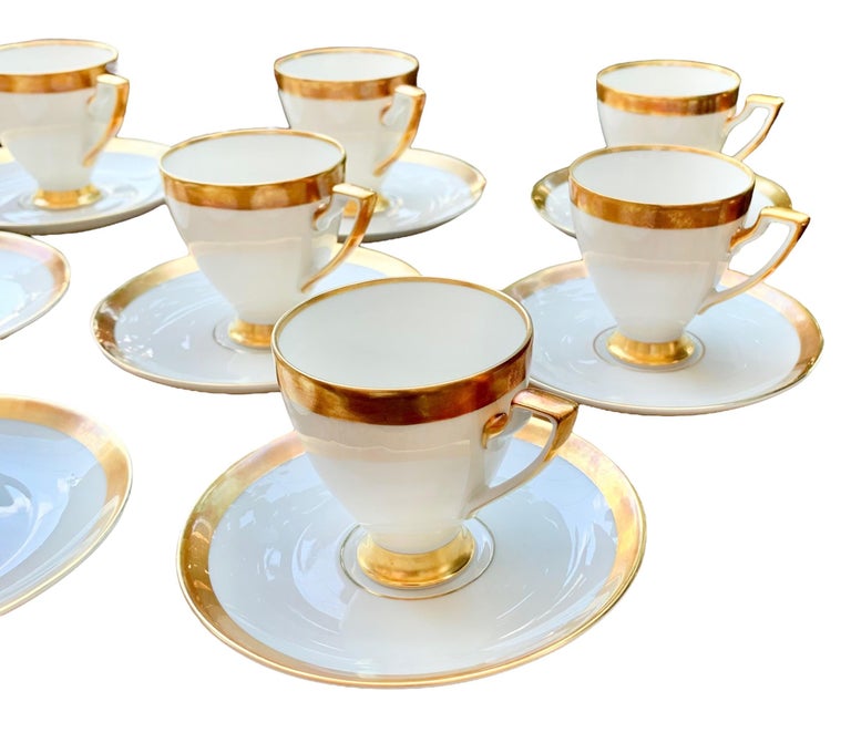 Presented here is a very elegant and at the same time
extremely classic breakfast set from the Bavarian
manufacturer H & C Selb Bavaria, Germany Heinrich 1800. 
The set was made of
white porcelain. It consists of a mocha cup on a
foot and a