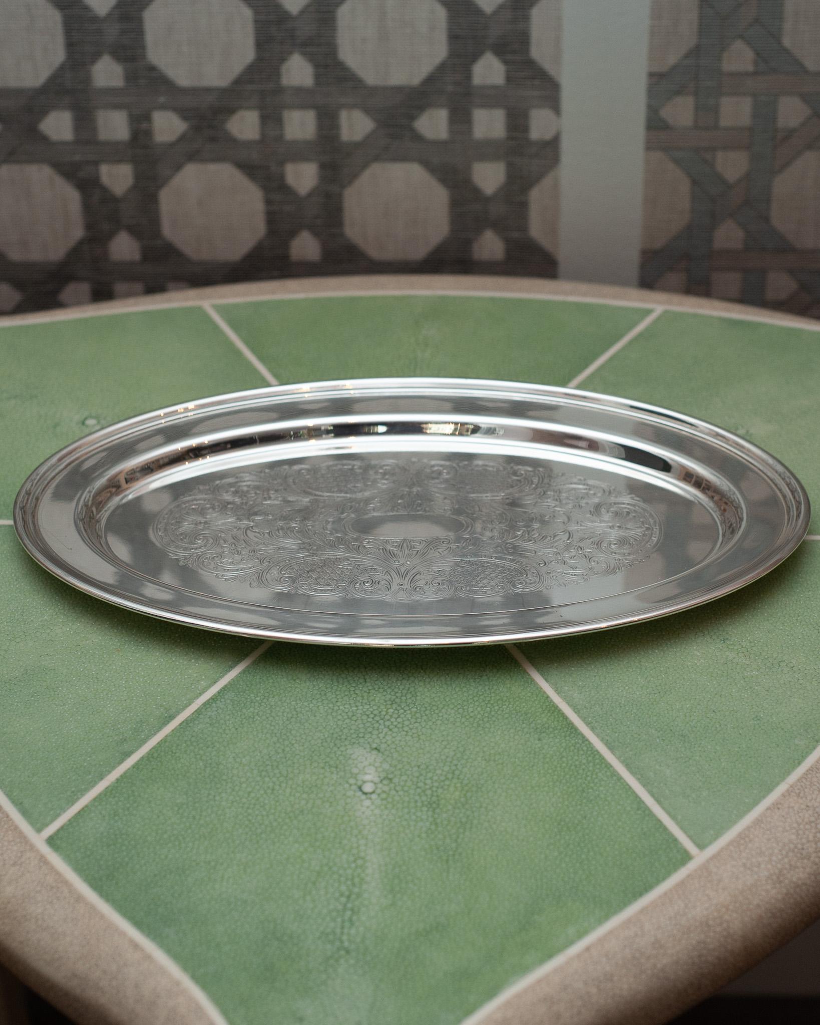 An antique Haddon Plate silver plate oval serving tray with engraved interior. Silver plated copper.