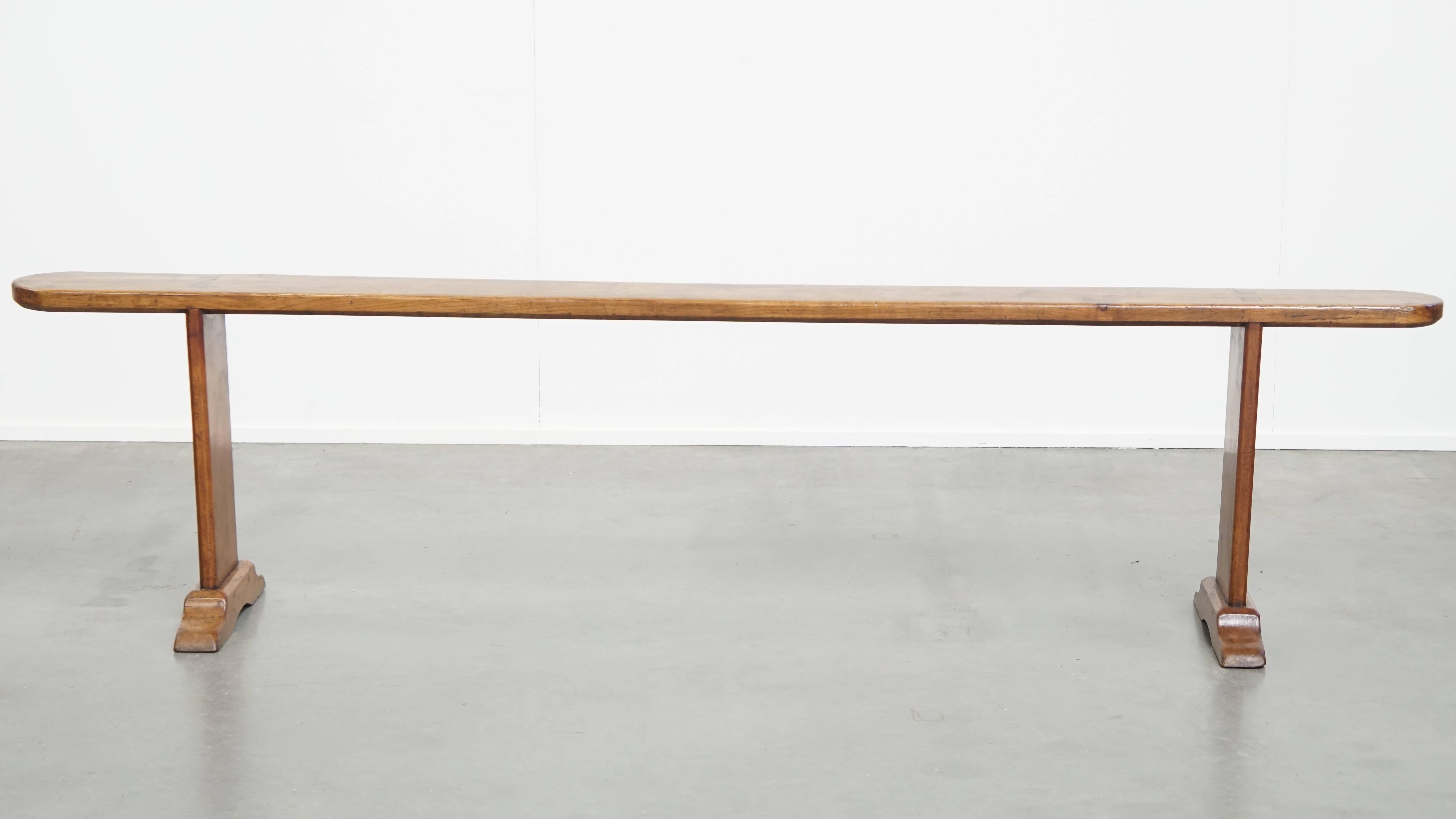 Offered here is this antique hall bench, also perfect as a dining bench, with a stylish and timeless look. For lovers of a warm and charming interior, a bench has long been a beautiful and practical addition to nearly any interior style — and this