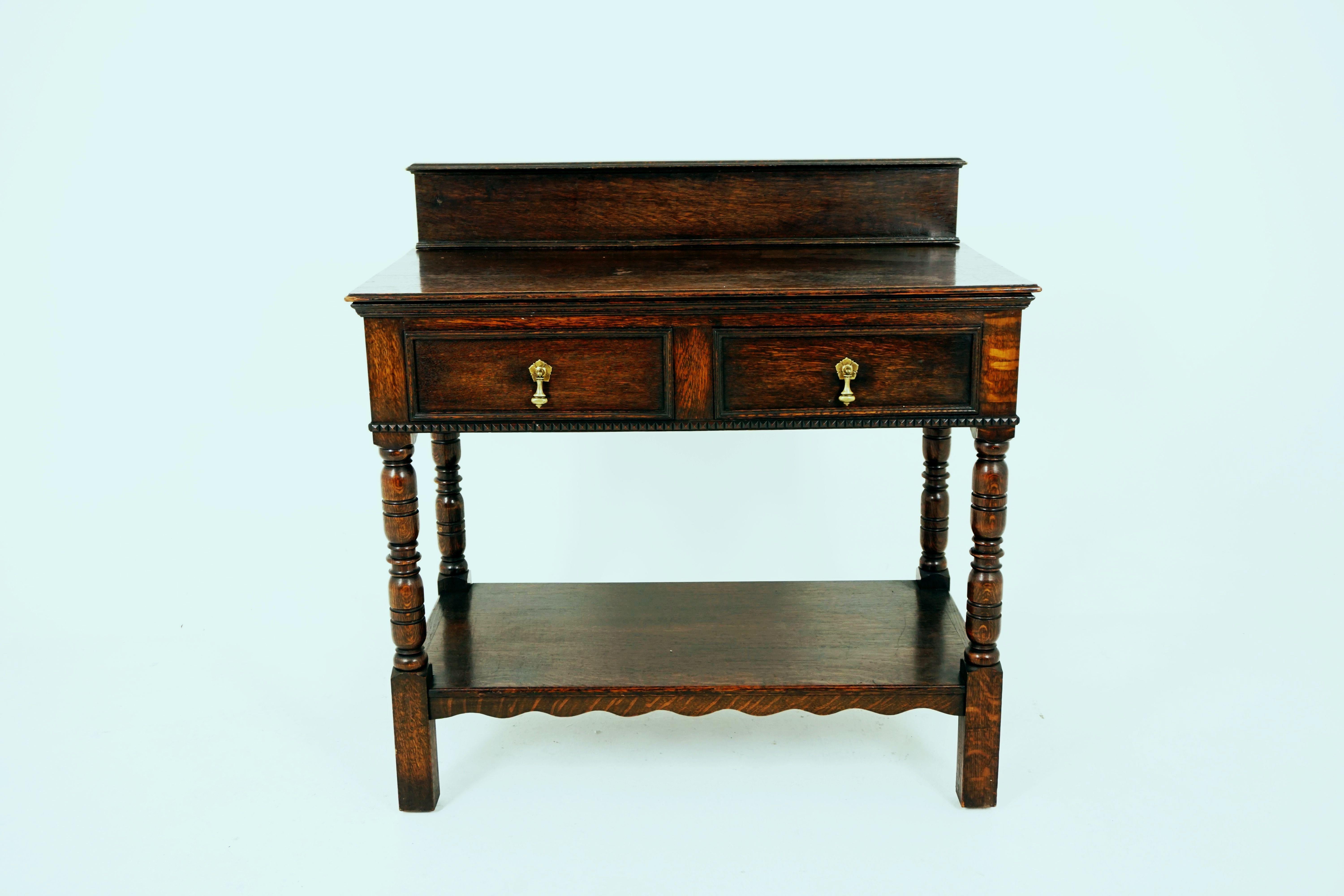 Antique hall table, tiger oak serving table, made by T. Justice & Sons in Dundee, Antique Furniture, Scotland 1910, B1835

Scotland, 1910
Solid oak construction
Original finish
Gallery back
Rectangular top
Pair of dovetailed drawers with