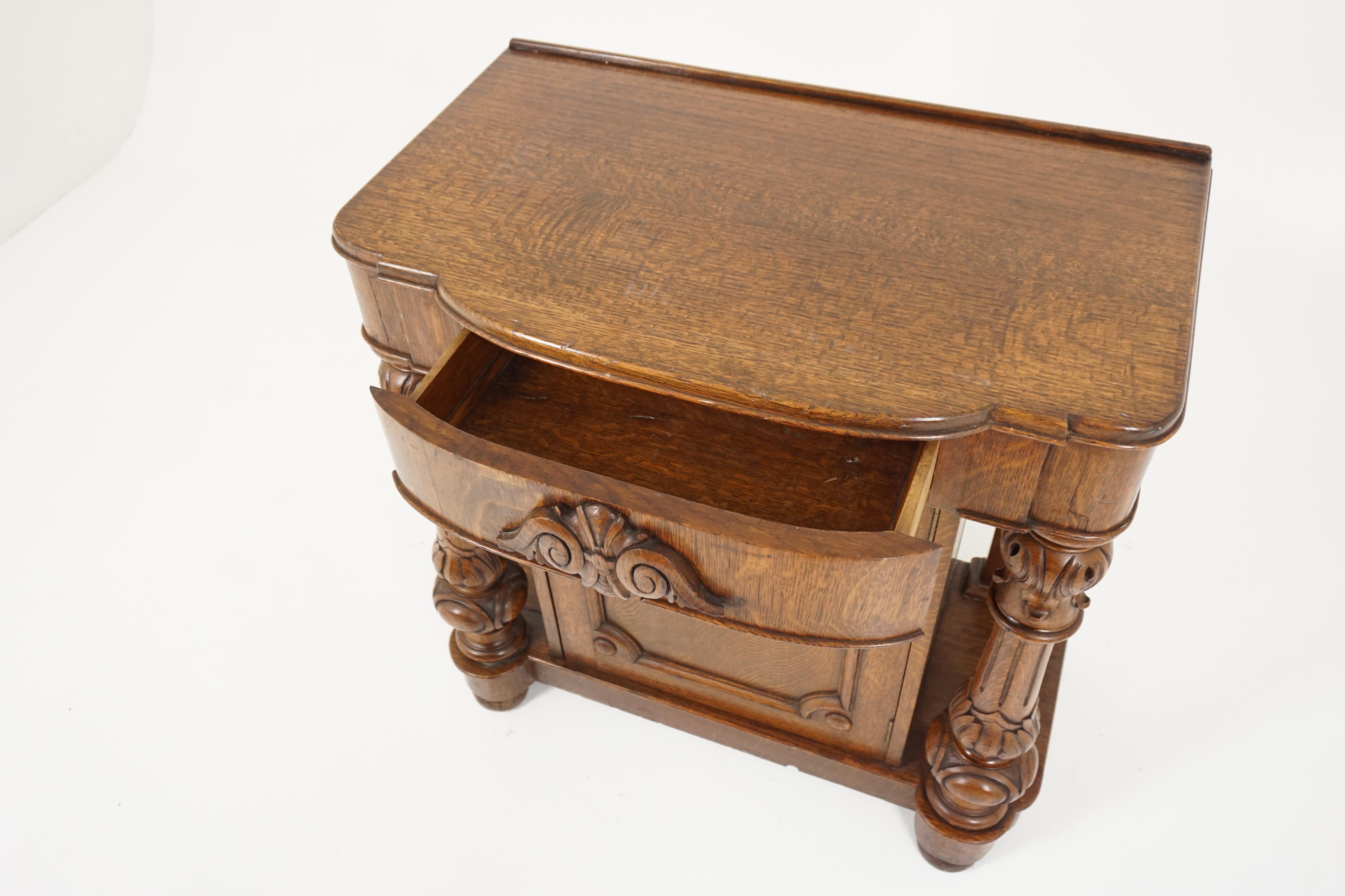 Antique hall table, Victorian carved tiger oak end table or lamp table, Antique Furniture, Scotland 1920, B2032

Scotland 1920
Solid oak and veneer
Original finish
Shaped tiger oak top
Single bow front drawer below
Pair of heavily carved