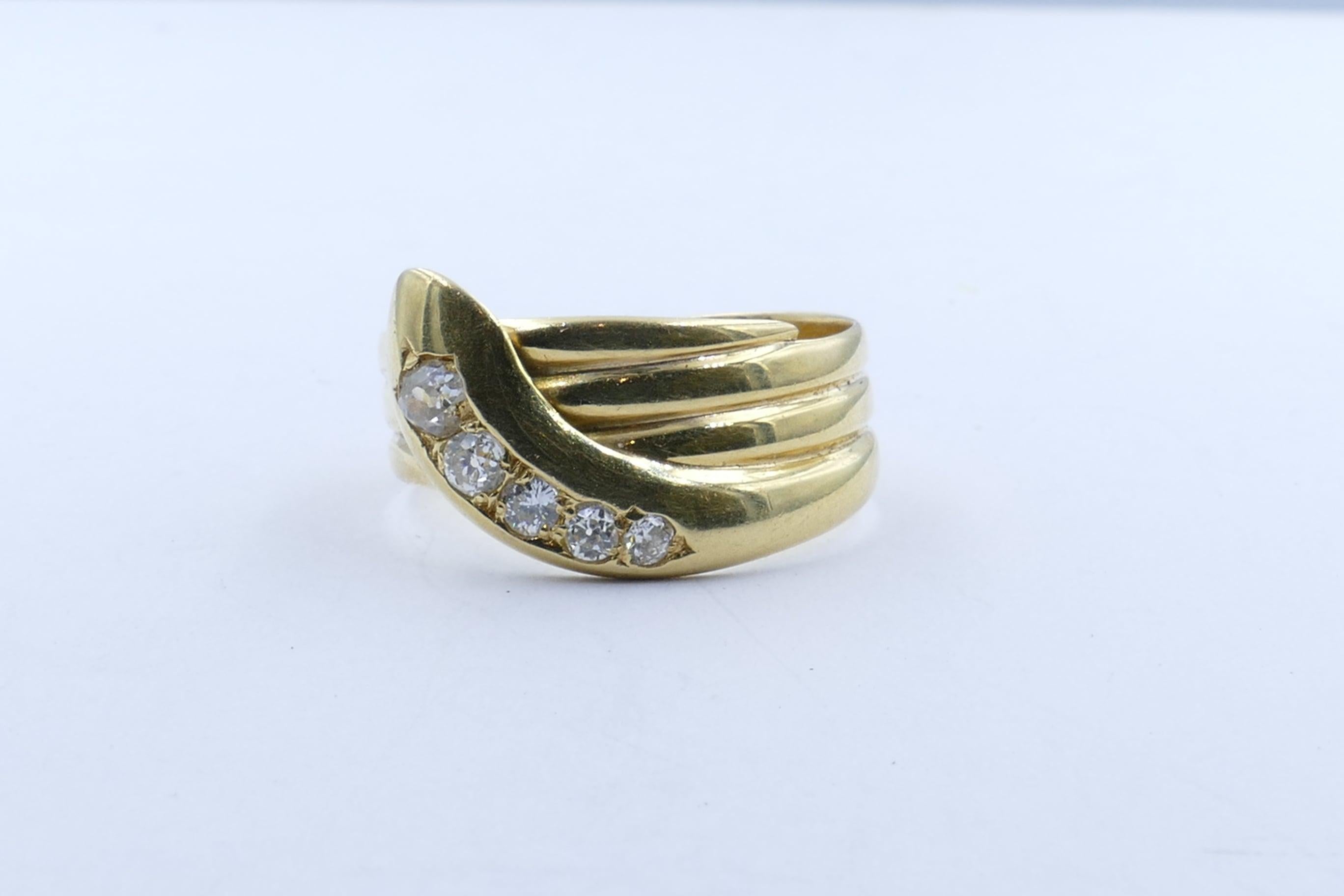 This Edwardian 5 excellent Diamond Snake Ring set in 18ct Yellow Gold is in terrific condition. The finger size is 'U' so probably originally made for a man but it would suit just as well a lady with larger fingers.
The Diamonds are round old cut,