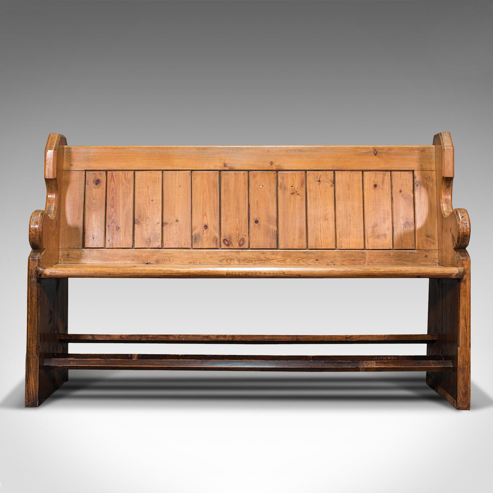 This is an antique hallway bench. An English, pine three-seat reception hall pew with ecclesiastic taste, dating to the late Victorian period, circa 1900.

Unwind upon this accommodating hallway bench for three
Displaying a desirable aged patina
