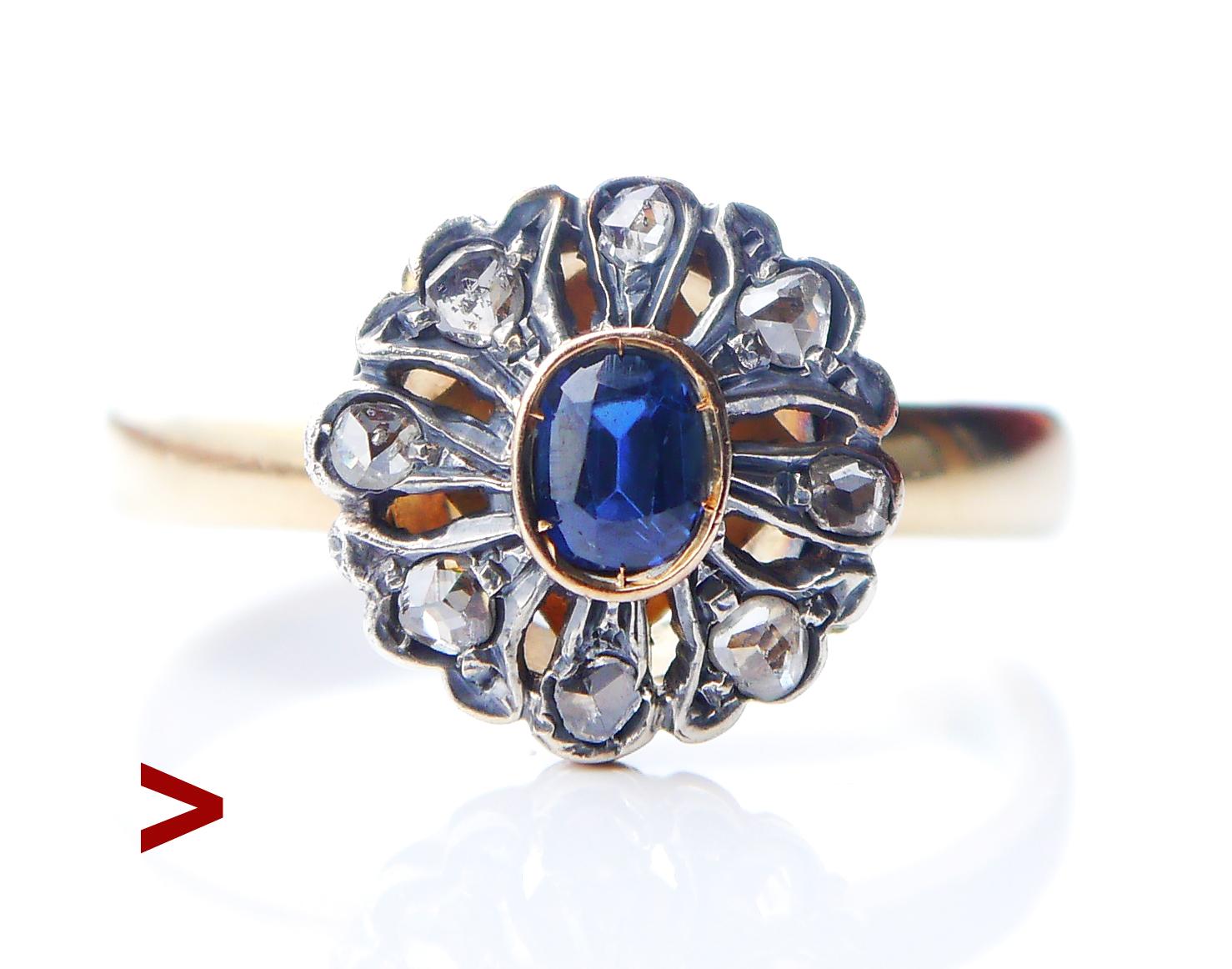 Beautiful Antique Halo Ring. Band in solid 18K Greenish Yellow Gold with Silver openwork crown featuring natural Blue Sapphire and 8 Diamonds. No hallmarks, European made ca 1900 s - 1930s.

Floret / crown measures Ø 13 mm x 7 mm deep ..

Sapphire