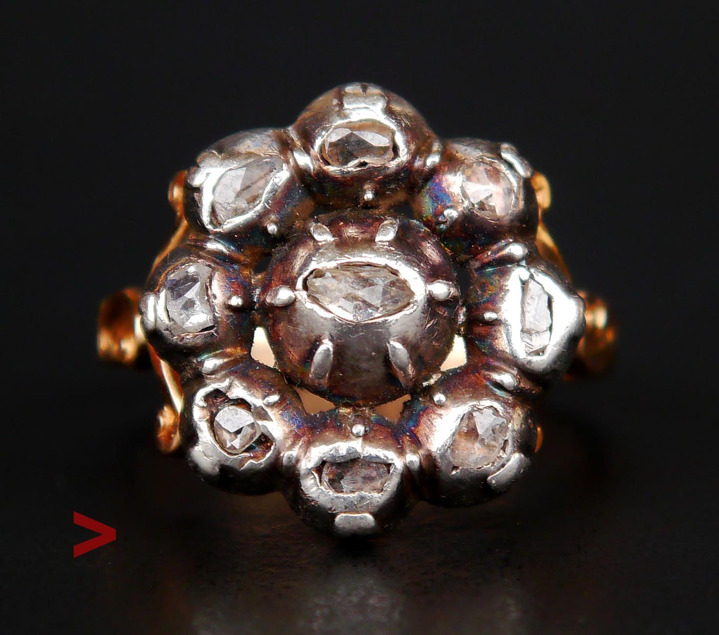 Diamond Flower Ring, Renaissance styled.

Likely German, made ca. 1850s -1920s.

The band is hallmarked /tested 18K Yellow Gold, top crown is made of Silver.

The flower crown is Ø 17 mm x 6.5 mm deep.
Nine rose - cut Diamonds arranged in a flower