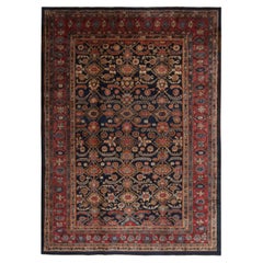 Tapis persan ancien en laine rouge à motifs géométriques floraux et bleu marine de Rug & Kilim