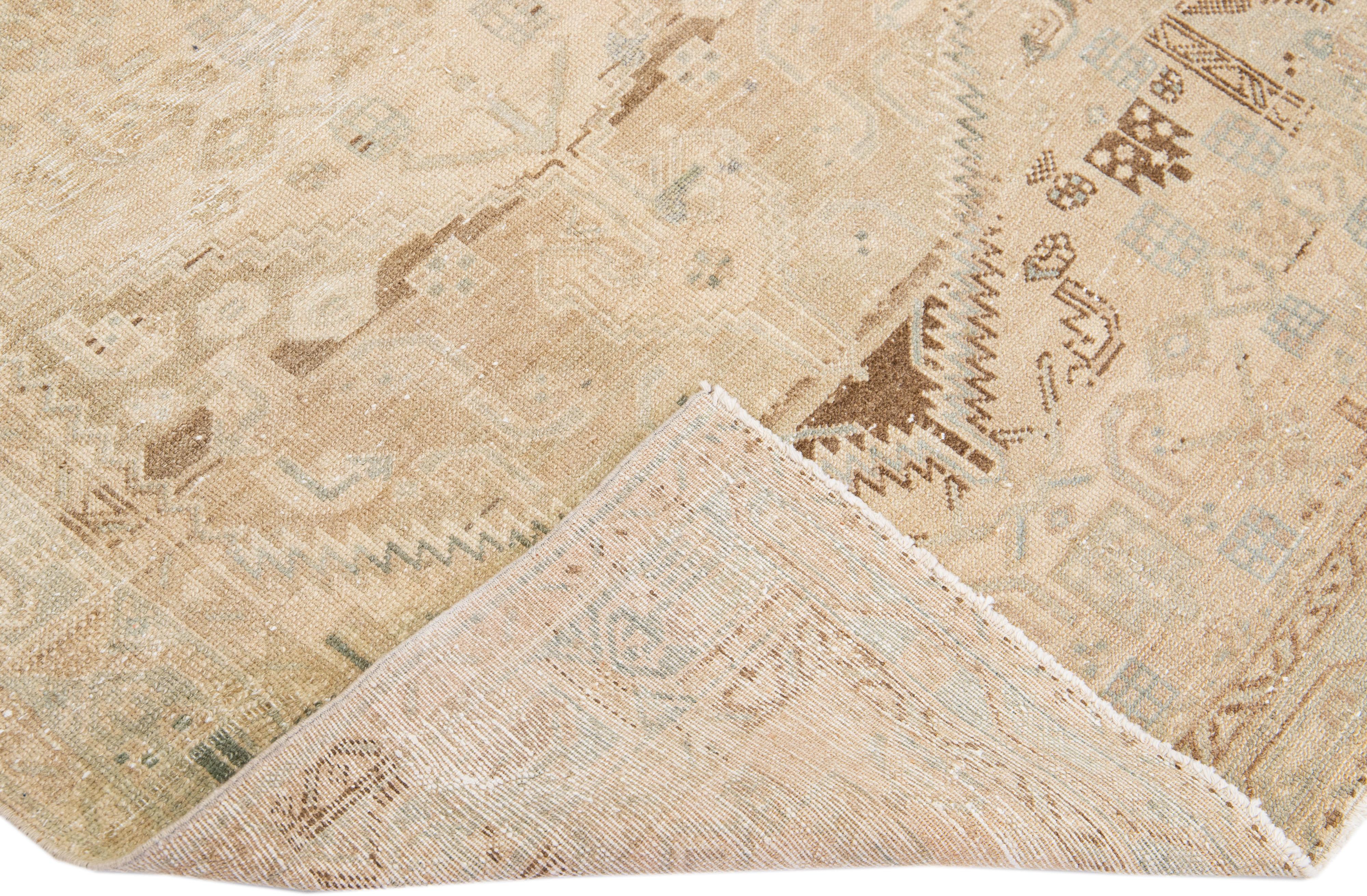 Beautiful antique Hamadan hand-knotted wool rug with a beige field. This Persian piece has brown and blue accents in a gorgeous all-over floral pattern design.

This rug measures: 4'1