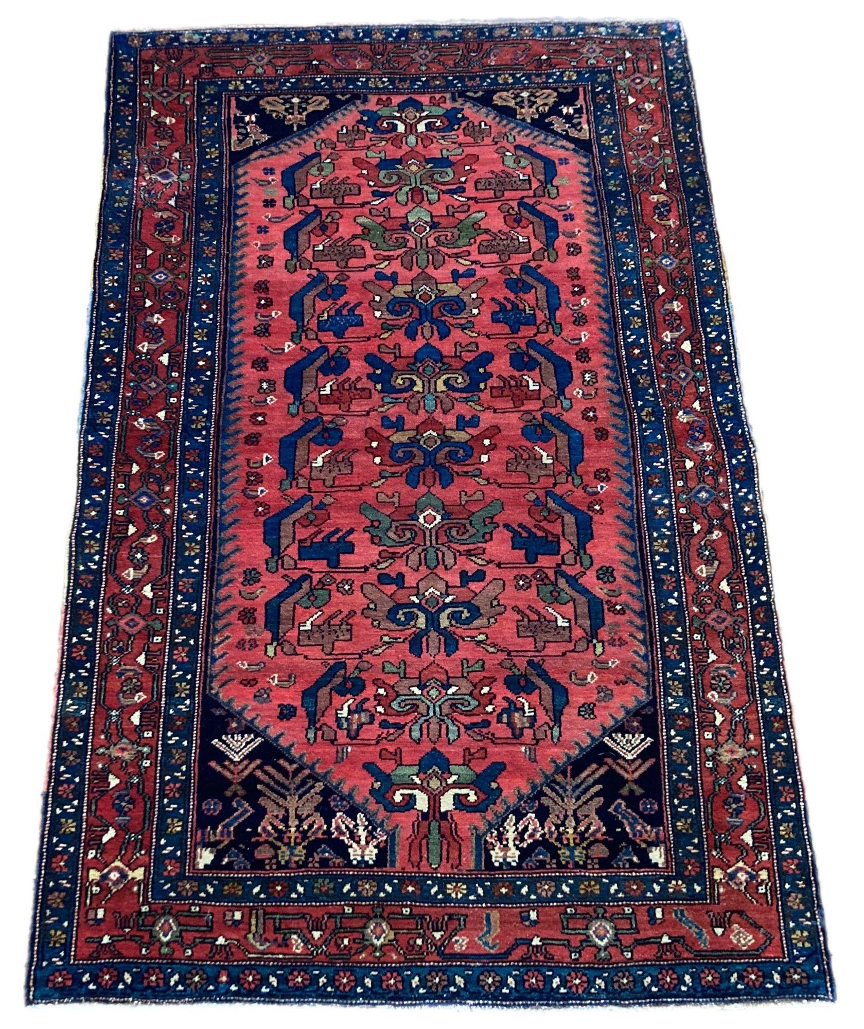A beautiful antique Hamadan rug, hand woven circa 1920 with an all over design on a terracotta field and similar border. Wonderful secondary colours of blues and greens and a very decorative rug.
Size: 1.97m x 1.22m (6ft 6in x 4ft)
This rug is in