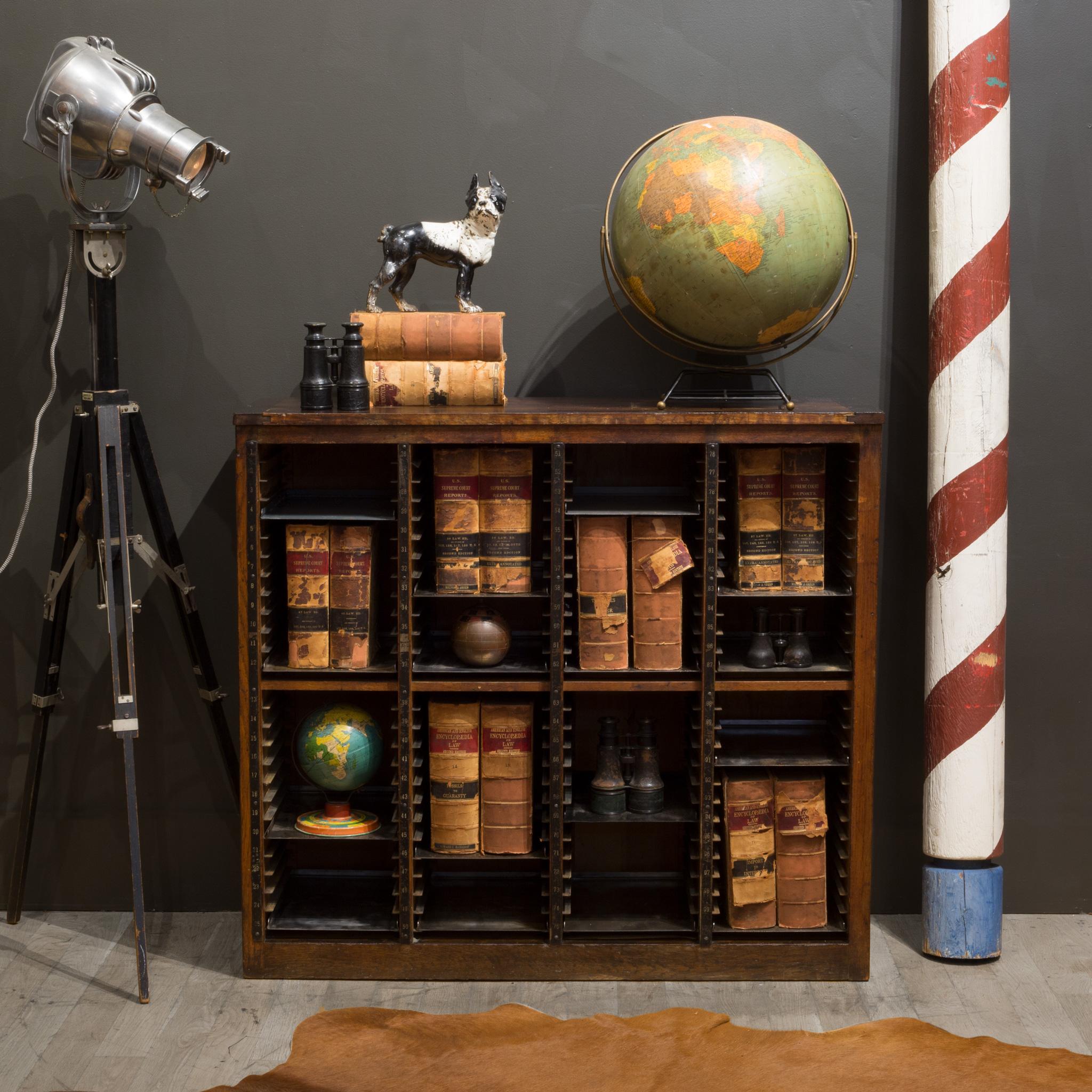 ABOUT

An early 20th century typesetter's storage cabinet with 100 metal trays and numbered metal strips in front. The metal trays were used by typesetters to store the metal typesets used for a job. The full trays were then placed back in backwards