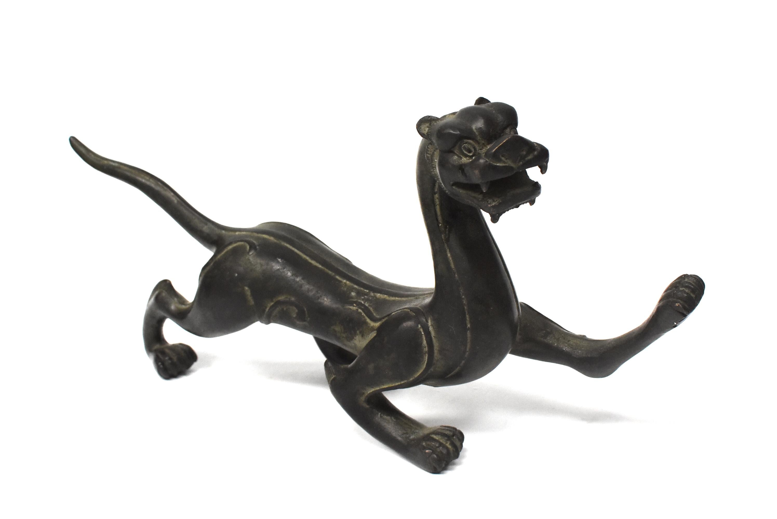 The dragon is the most important symbol in Chinese culture. A sign used by the Emperors, it represents power, leadership and prosperity. This wonderful sculpture captures the dragon in motion. The style is typical Han, which depicts a dragon with