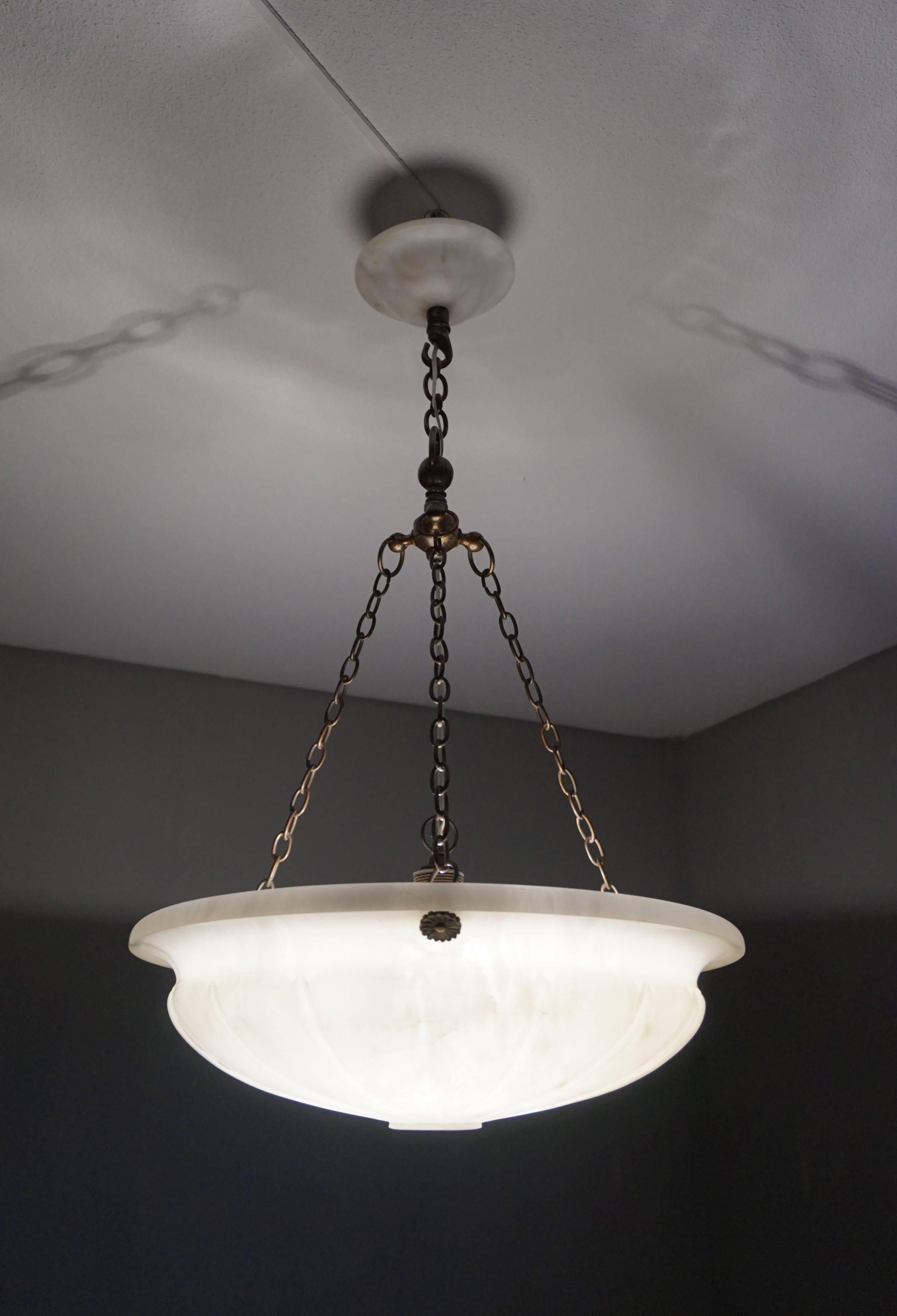 Amazing quality, excellent condition and perfectly balanced chandelier.

If you are looking for a stylish European, antique light fixture to grace your living space then this classical French beauty could be perfect for you. We have never seen an